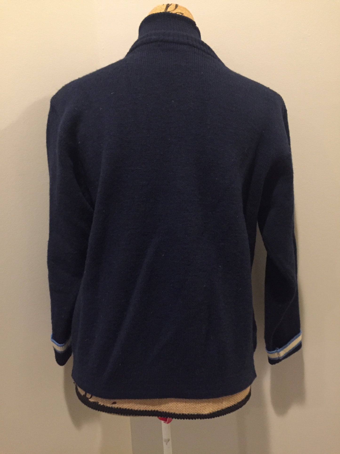 Kingspier Vintage - Vintage wool zip up cardigan in blue with white stripe trim, zipper closure and pockets. Made in Alberta. Size large.