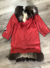 Load image into Gallery viewer, Kingspier Vintage - Children’s red northern parka featuring a hood, fur trim and pom poms, zipper closure, wool lining, patch pockets, embroidered winter scenes along the front. Made in Canada.
