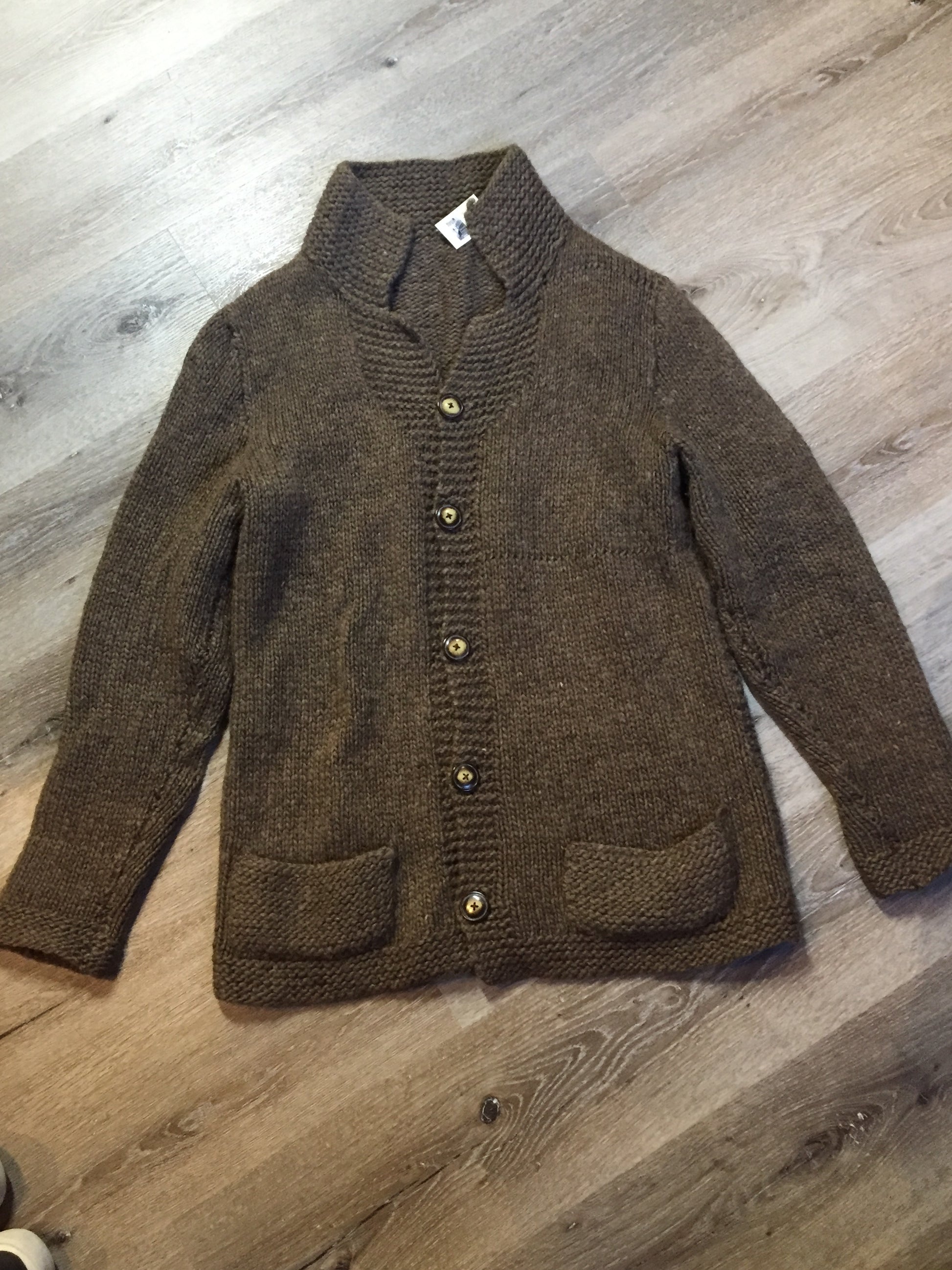 Kingspier Vintage - Hand knit and handspun undyed wool cardigan in brown with button closures and pockets. Made in Nova Scotia, Canada.