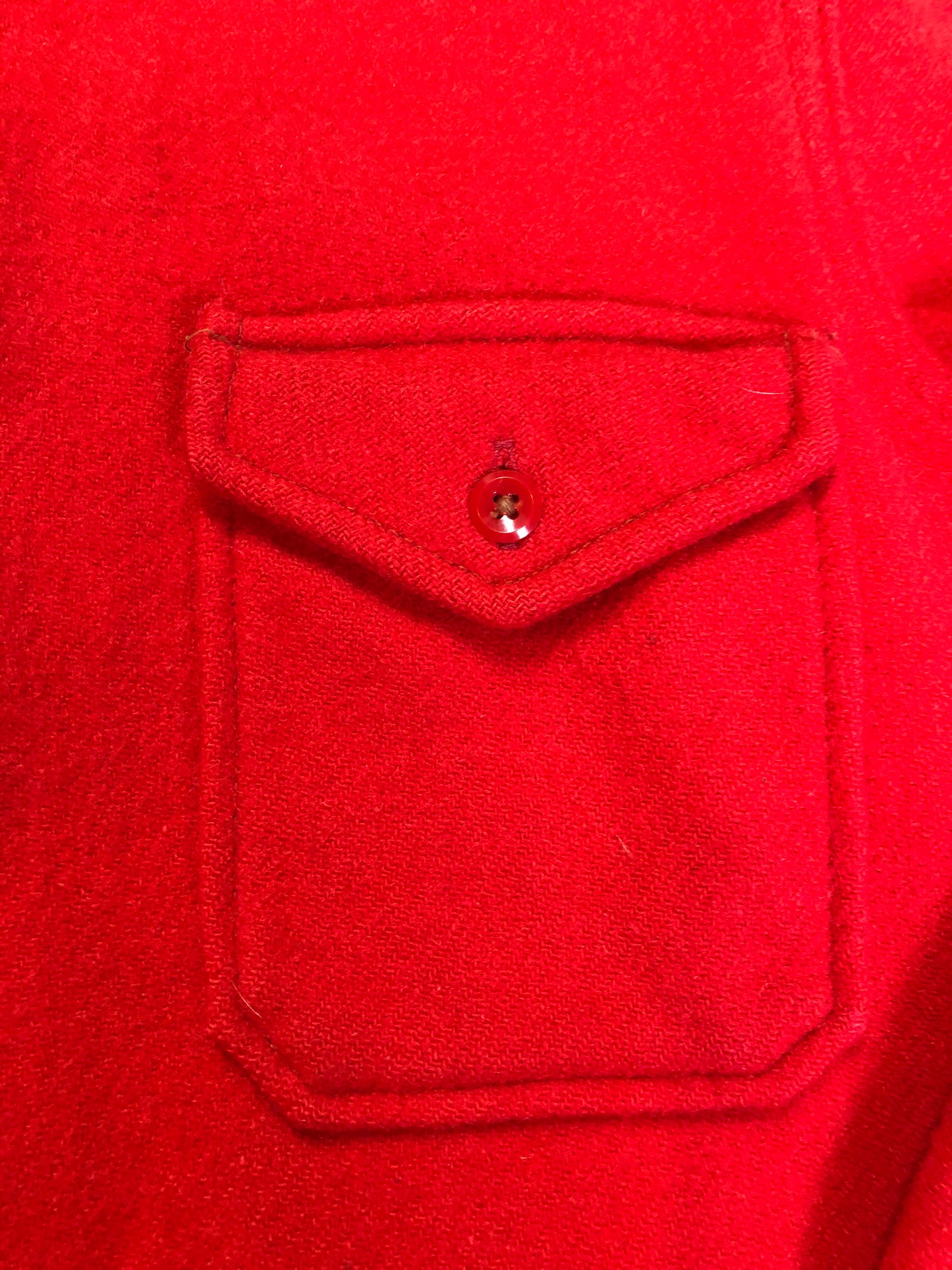 Kingspier Vintage - Soo Wool vibrant red lumberjack shirt with button closures and two flap pockets on the chest. Made in the USA.
