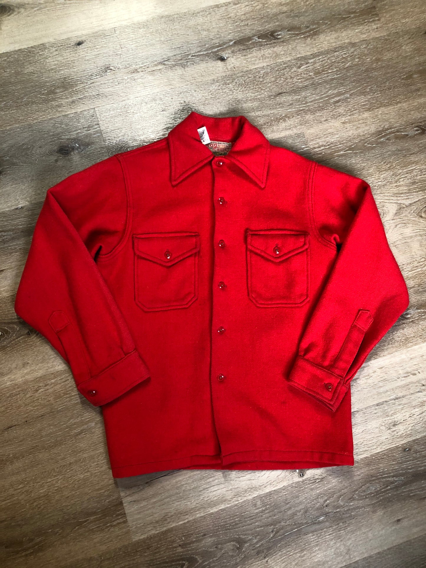Kingspier Vintage - Soo Wool vibrant red lumberjack shirt with button closures and two flap pockets on the chest. Made in the USA.
