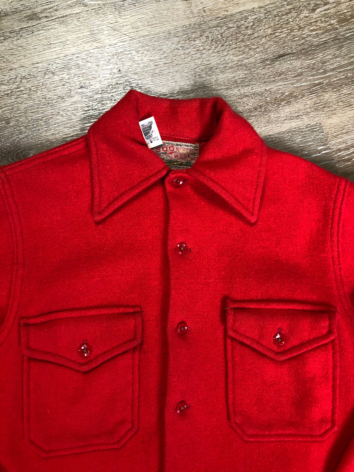 Kingspier Vintage - Soo Wool vibrant red lumberjack shirt with button closures and two flap pockets on the chest. Made in the USA.