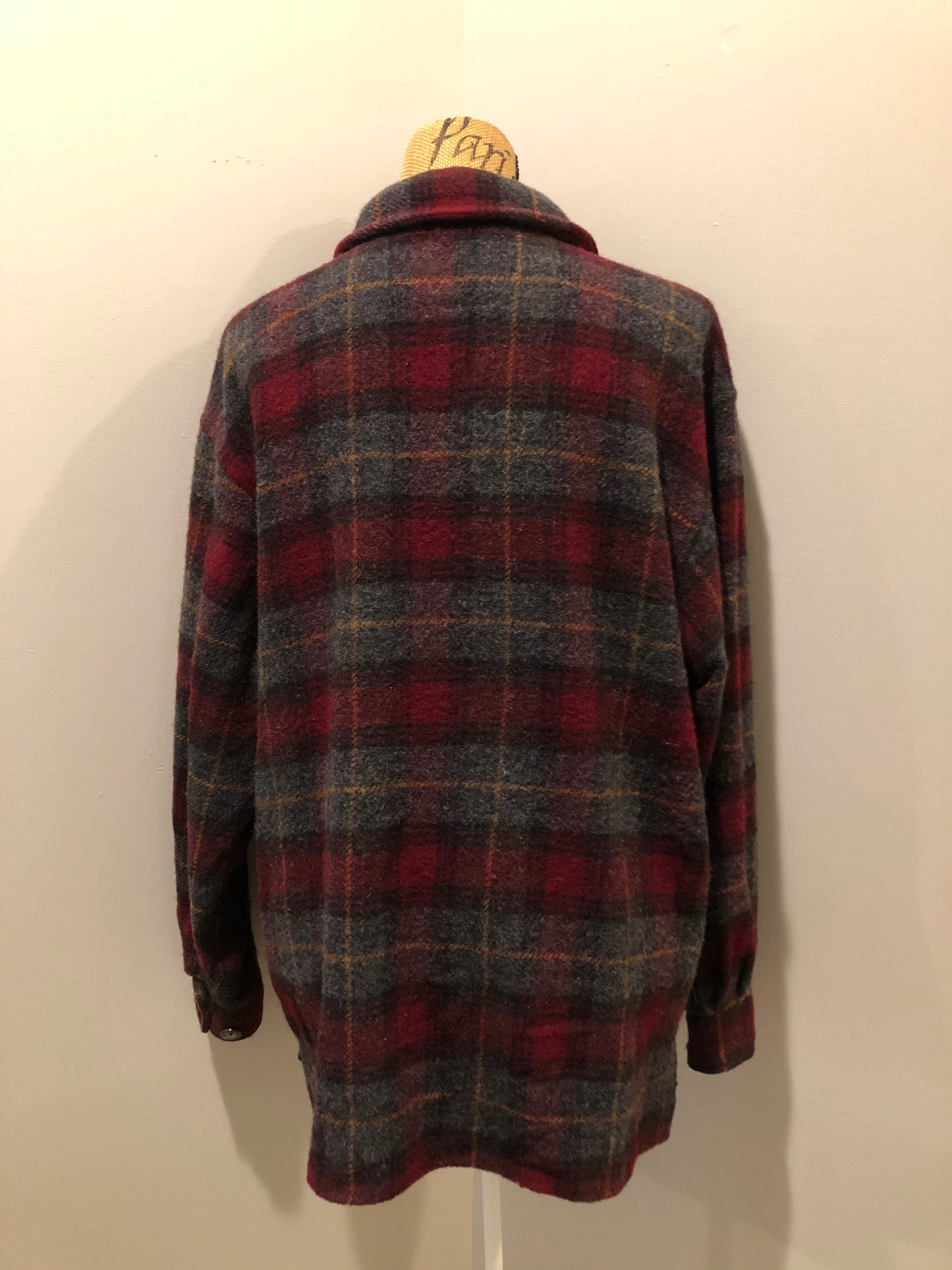 Kingspier Vintage - Woolrich red and grey plaid wool lumberjack shirt with button closures and one patch pocket on the chest.