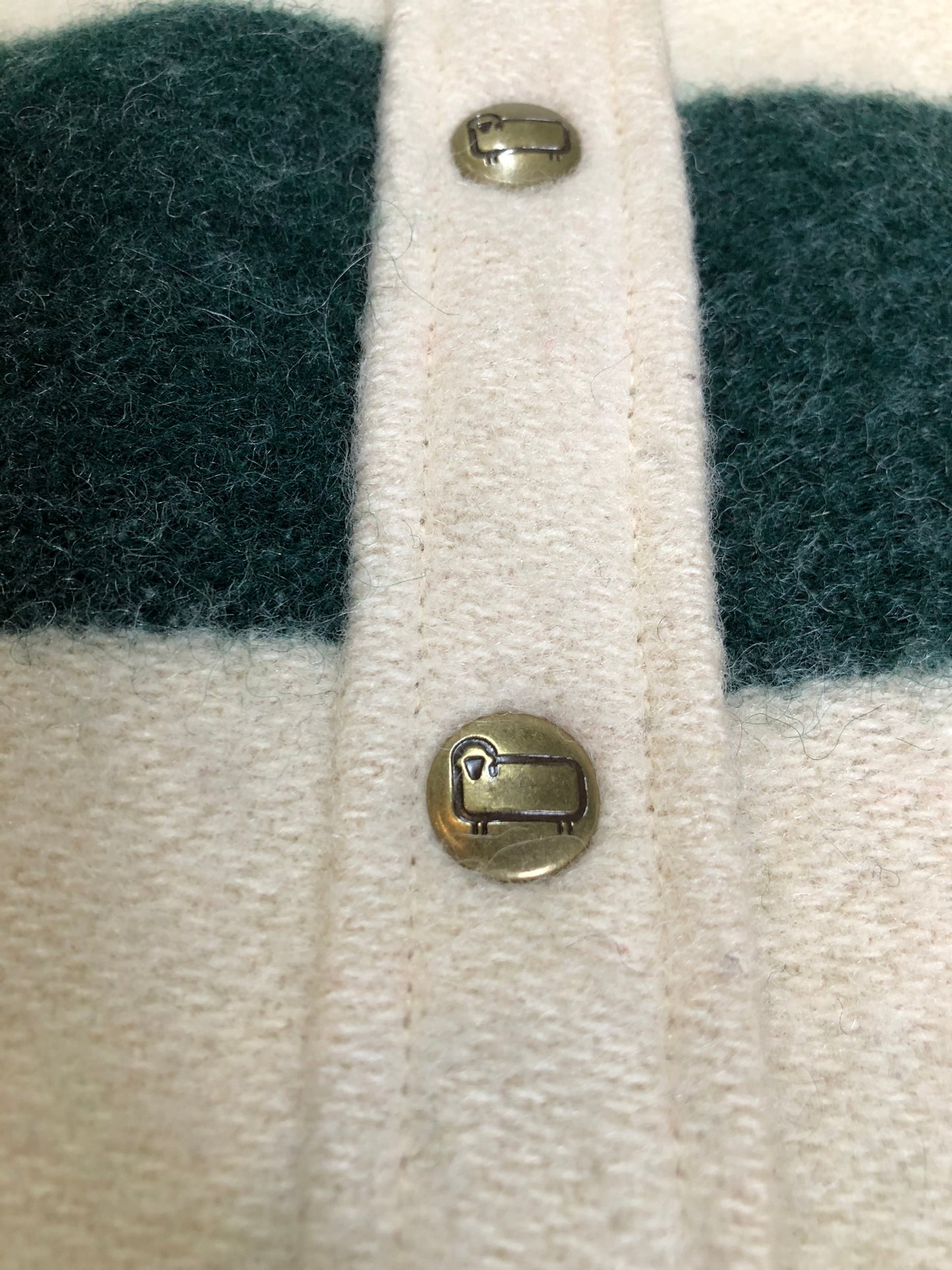 Kingspier Vintage - Woolrich 1970's wool half snap blanket sweater with green. red and yellow stripe. This sweater features half snap closures and a pouch pocket in the front.