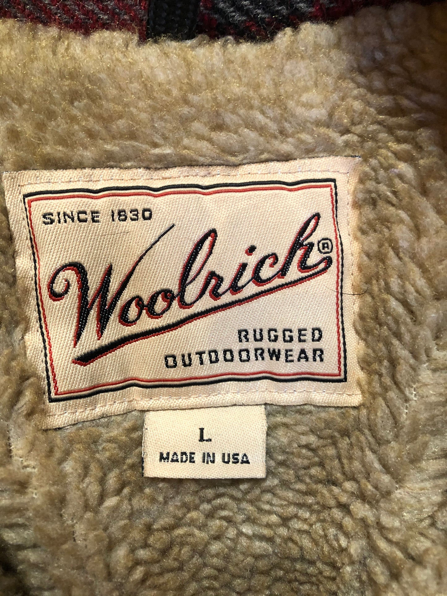 Kingspier Vintage - Woolrich Rugged Outdoor Wear red plaid wool jacket with button closures, two flap pockets and a fleece lining. Made in the USA. Size large.