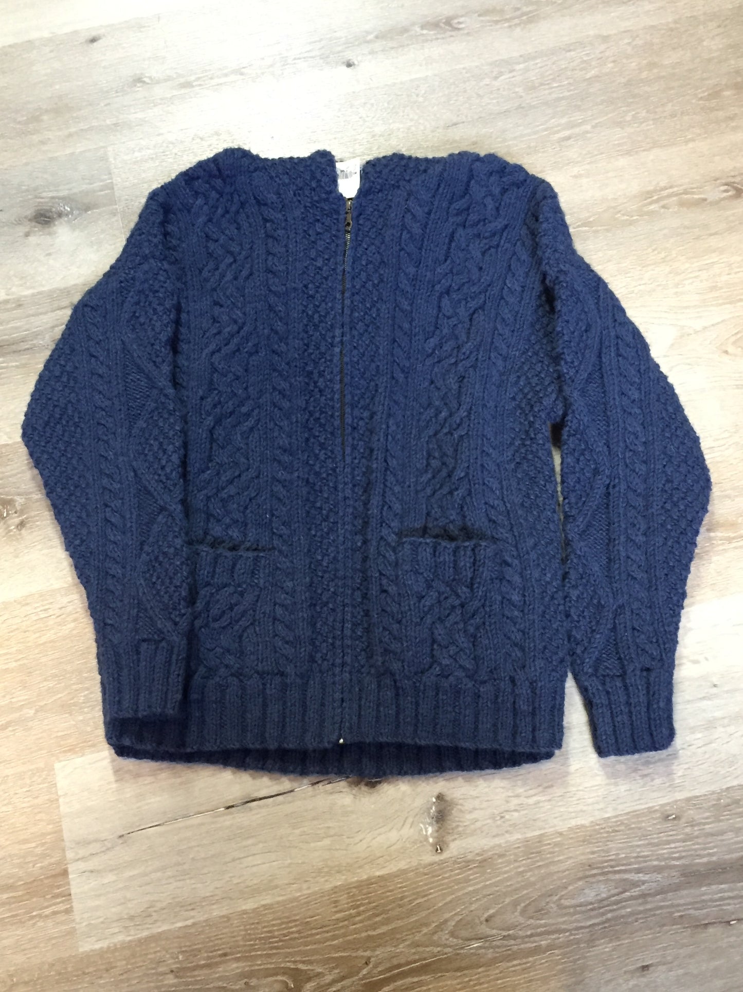 Kingspier Vintage - Vintage Romney wool honeycomb, diamond and cable knit cardigan in dark blue with hood, zipper and patch pockets. Size medium.
