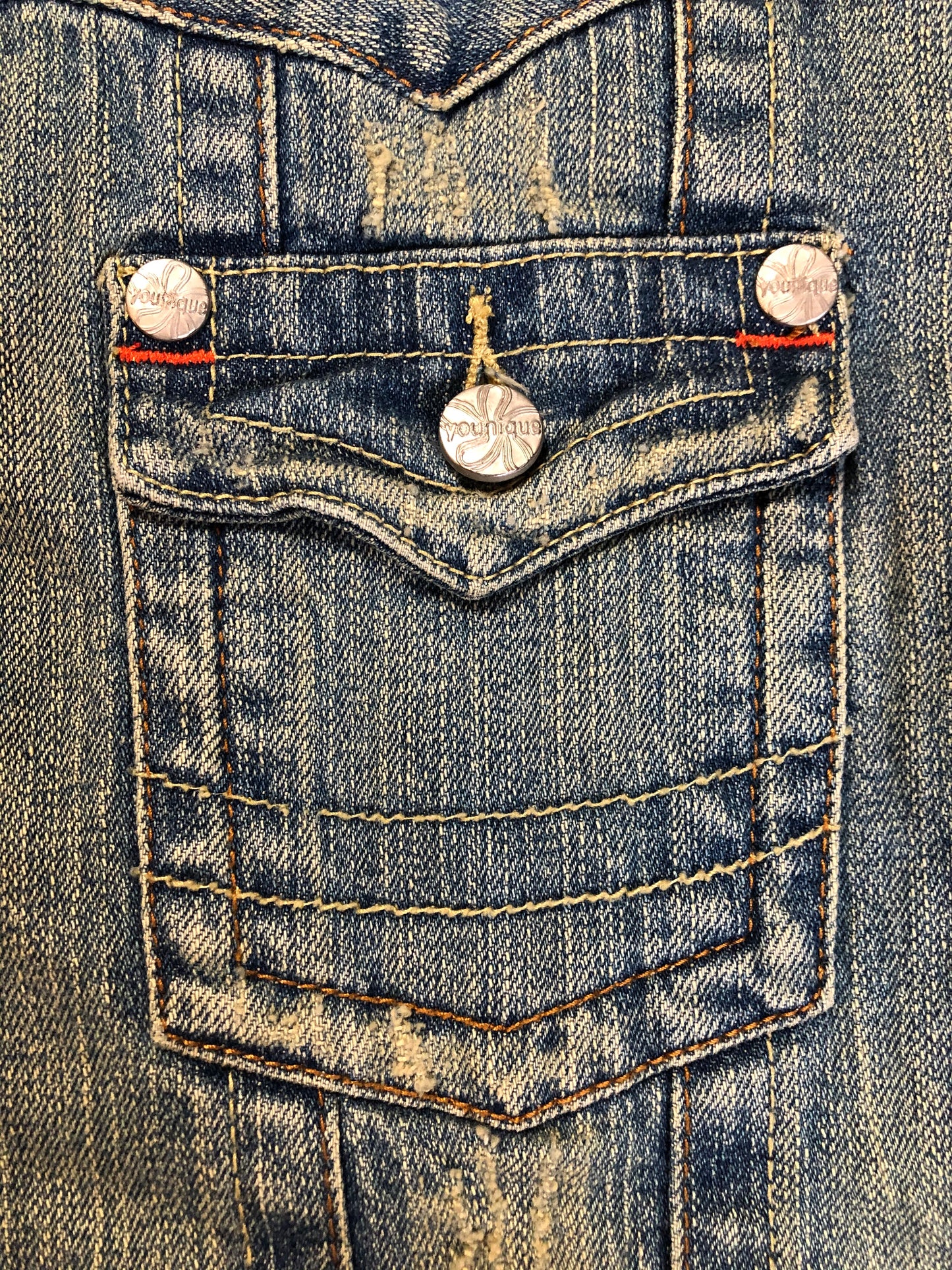 Kingspier Vintage - Younique denim jacket in a distressed light wash with colourful striped wool blend lining, button closures and two flap pockets. Size large, fits more like a medium.