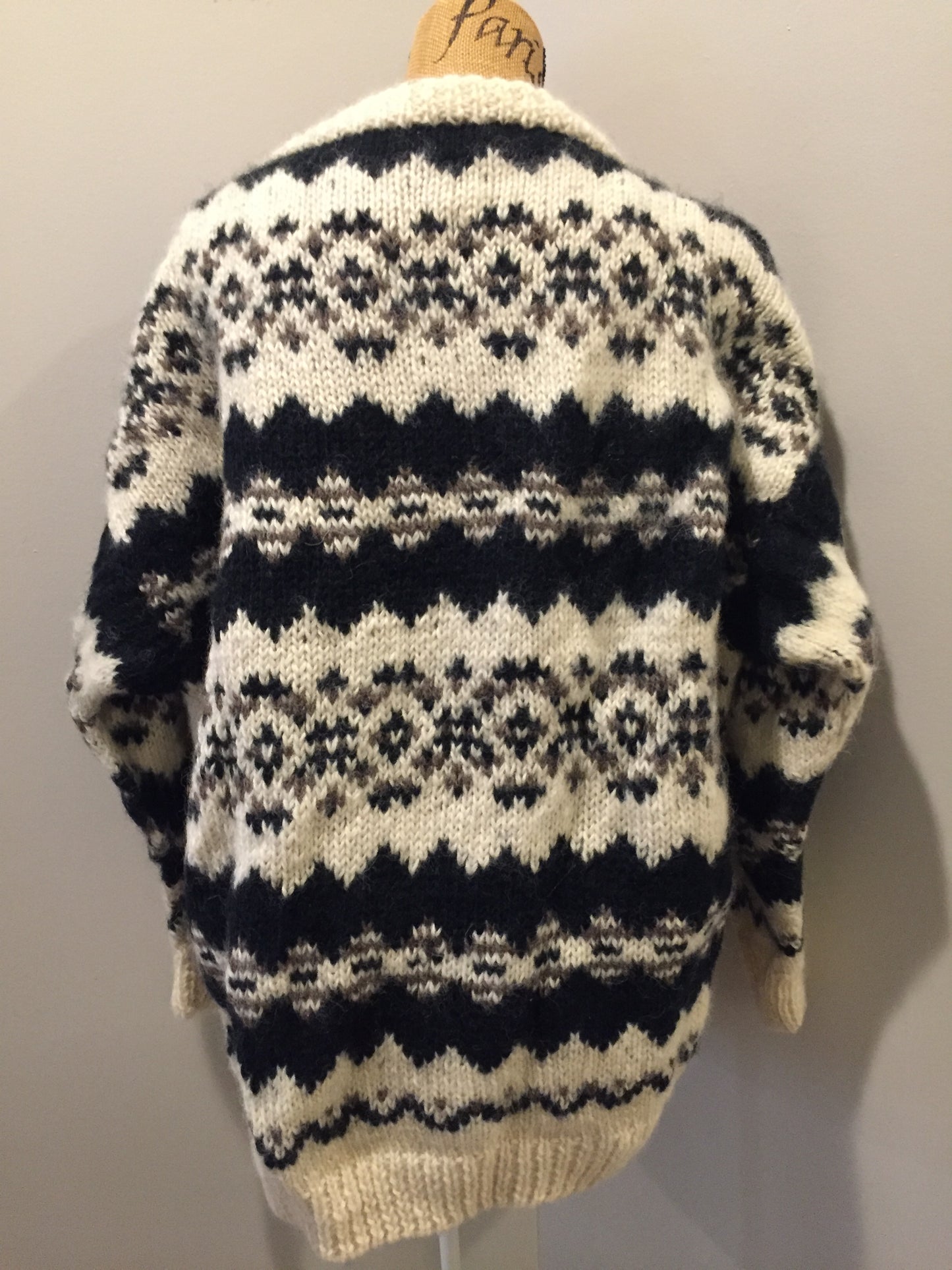 Kingspier Vintage - Vintage Casbah Imports wool cardigan in cream, black and brown with button closures and pockets. Size XXL.