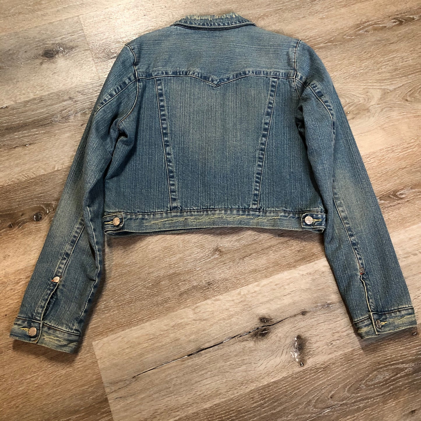 Kingspier Vintage - Younique denim jacket in a distressed light wash with colourful striped wool blend lining, button closures and two flap pockets. Size large, fits more like a medium.