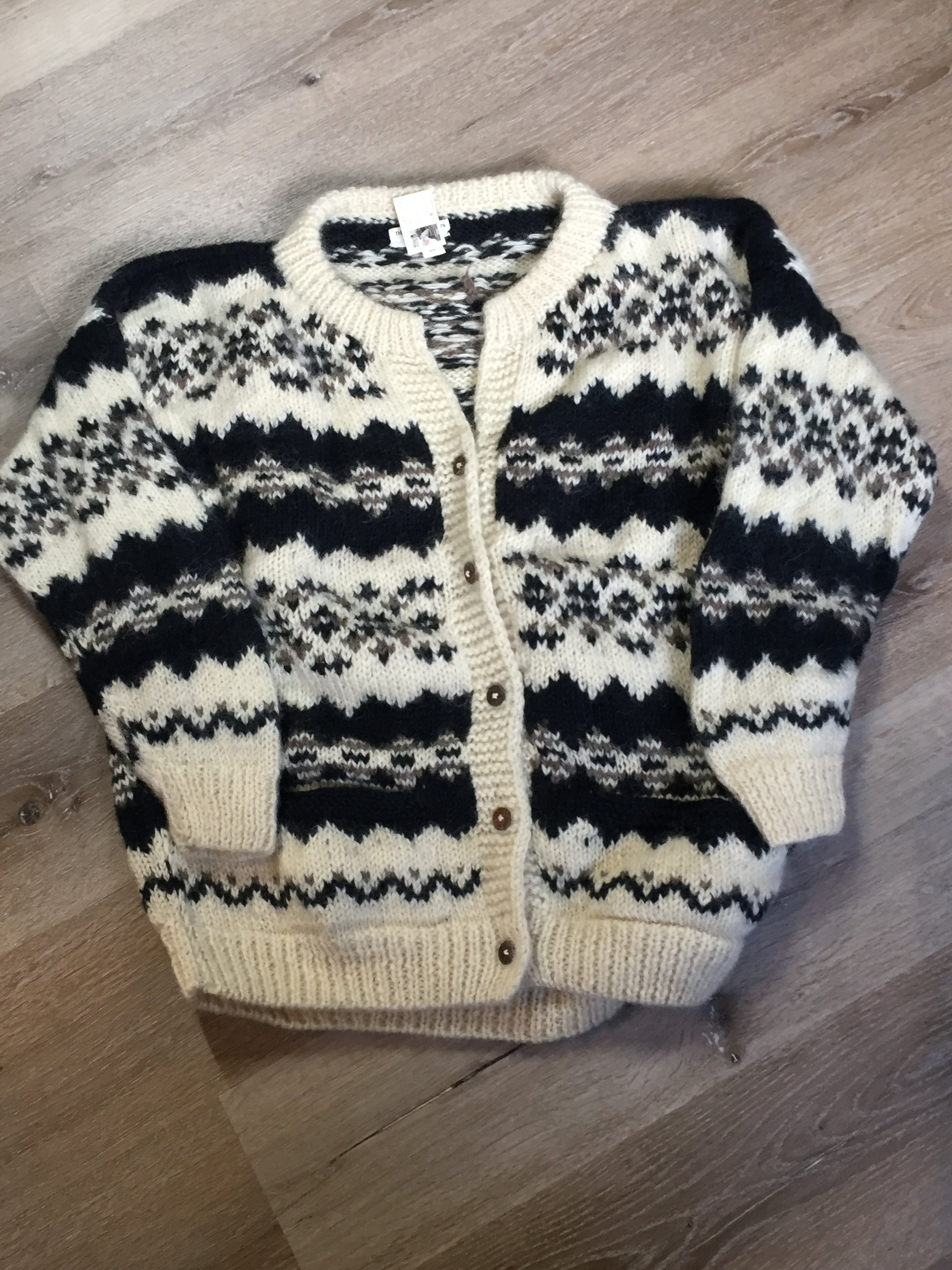 Kingspier Vintage - Vintage Casbah Imports wool cardigan in cream, black and brown with button closures and pockets. Size XXL.