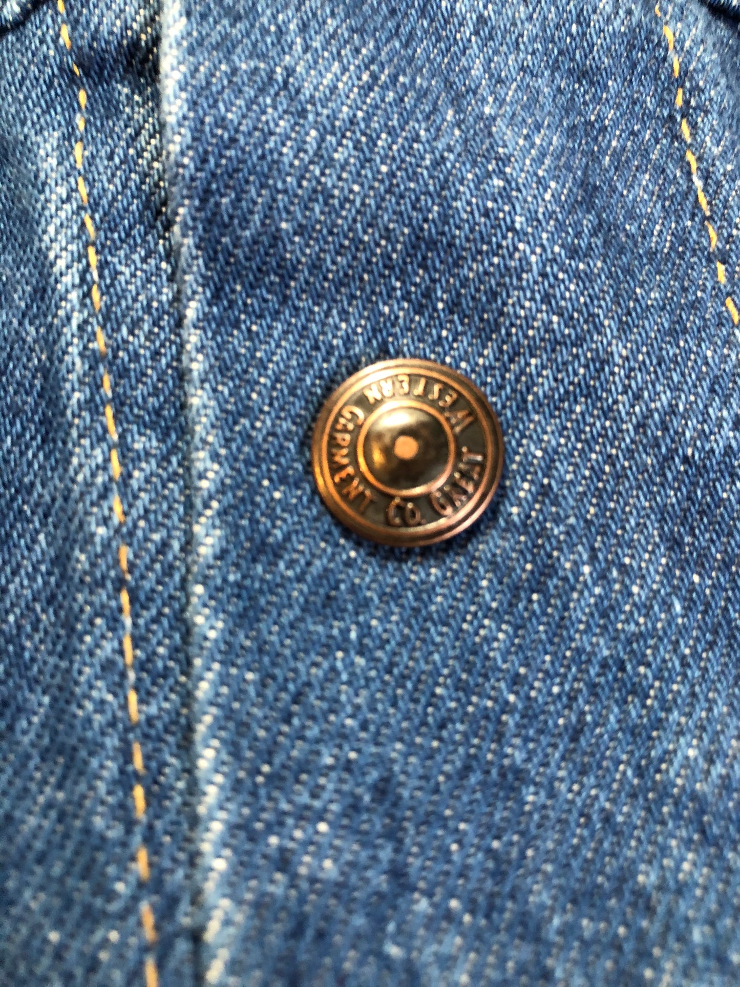 Kingspier Vintage - GWG (Great Western Garment Co.) denim jacket in a medium wash with snap closures and two flap pockets on the chest. Says size 12 fits XS. Canadian company.