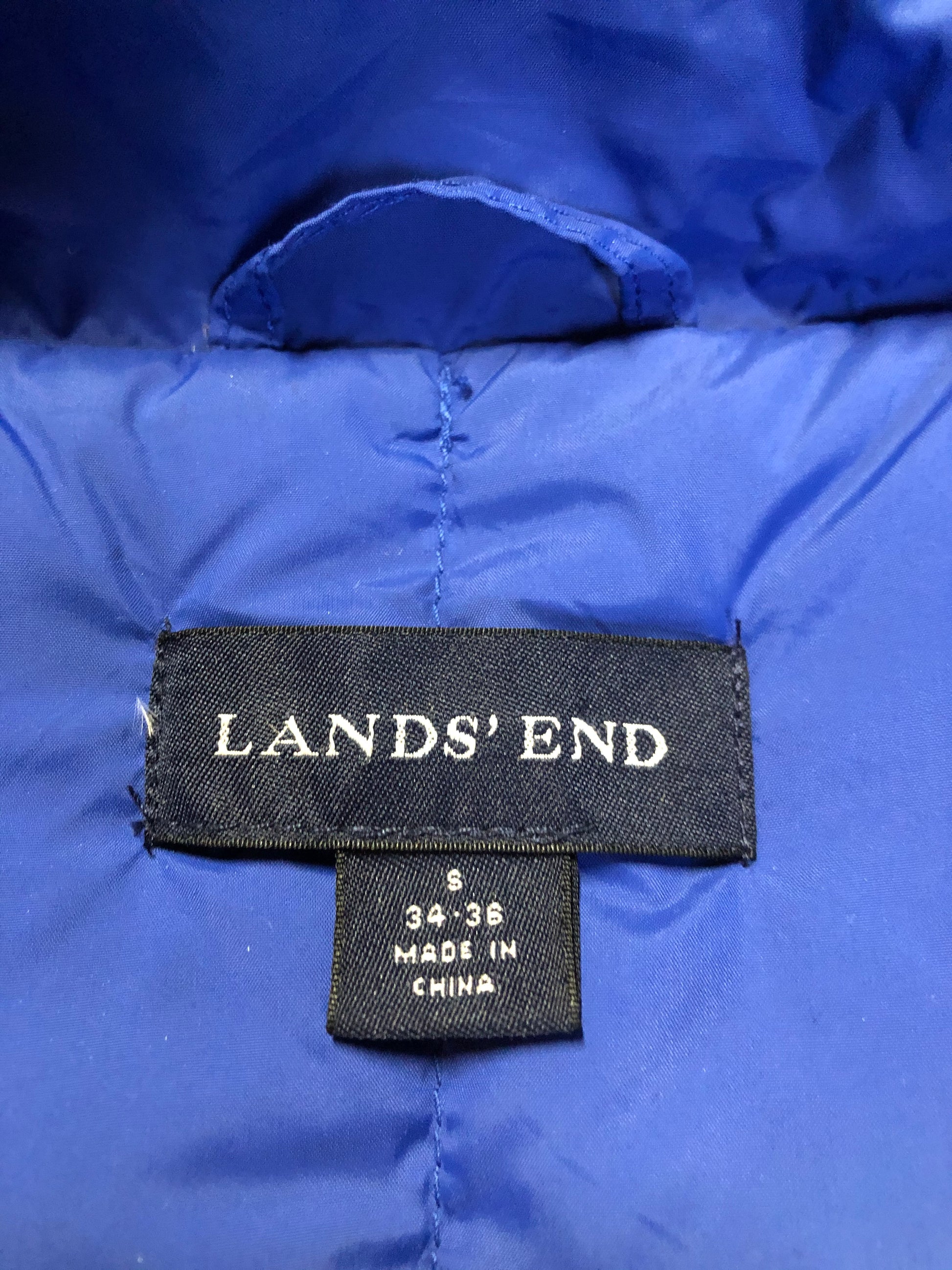 Kingspier Vintage - Land’s End blue down filled puffer vest with snap closures and slash pockets. Size small.