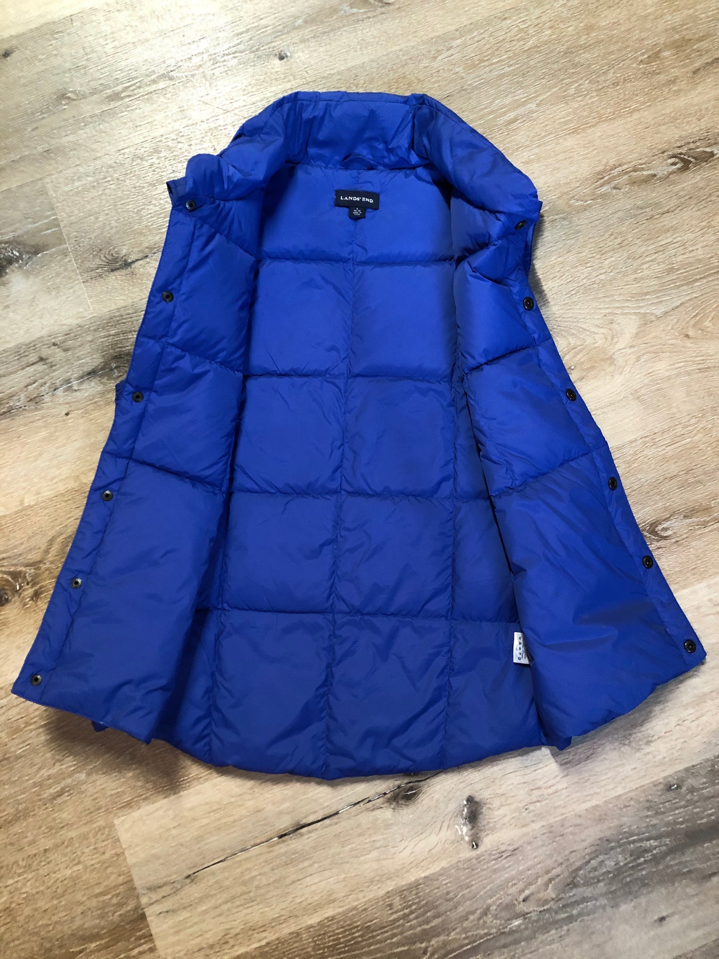 Kingspier Vintage - Land’s End blue down filled puffer vest with snap closures and slash pockets. Size small.