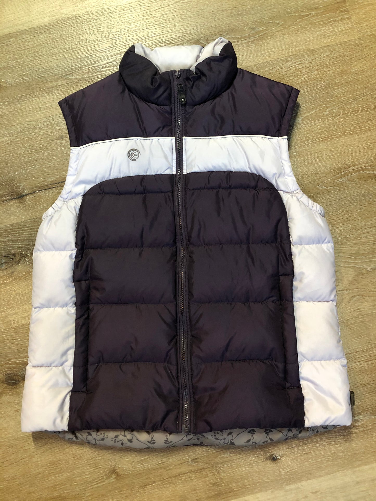 Kingspier Vintage - Columbia dark and light purple down filled puffer vest with zipper closure, vertical zip pockets and inside pocket. Size large.
