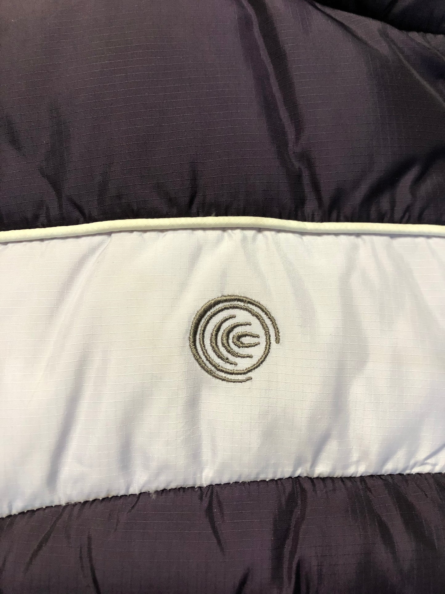 Kingspier Vintage - Columbia dark and light purple down filled puffer vest with zipper closure, vertical zip pockets and inside pocket. Size large.
