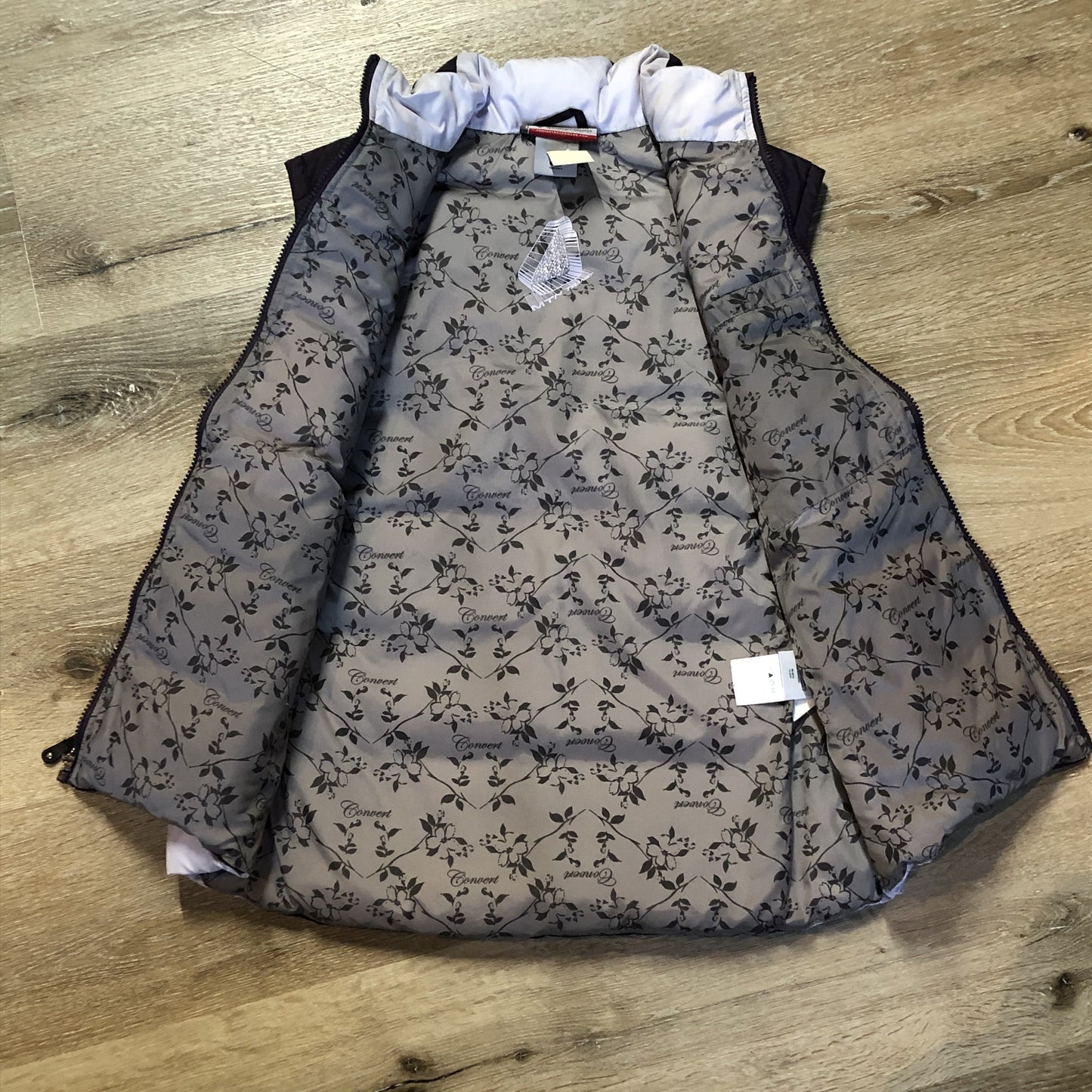 Kingspier Vintage - Columbia dark and light purple down filled puffer vest with zipper closure, vertical zip pockets and inside pocket. Size large.
