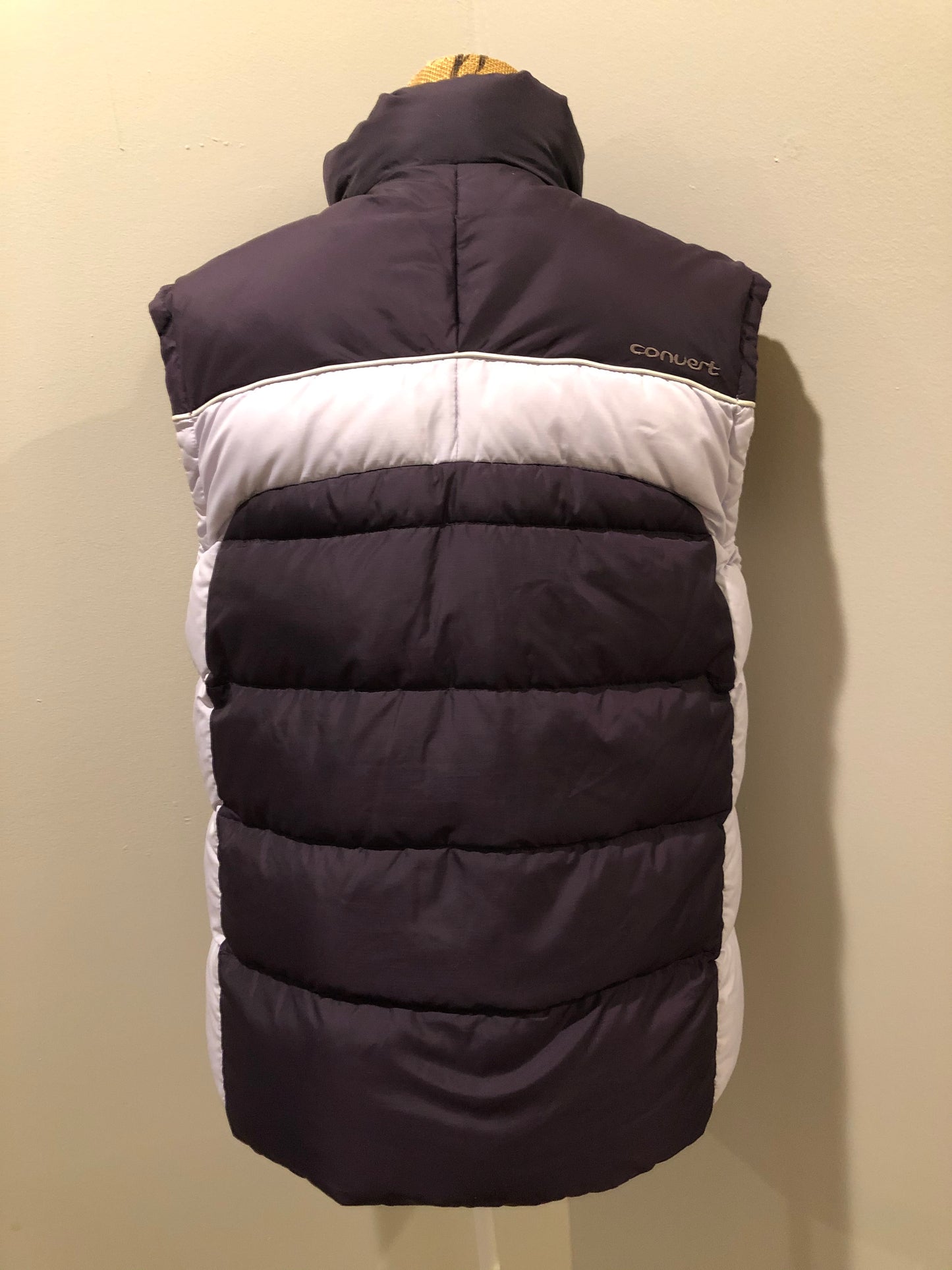 Kingspier Vintage - Columbia dark and light purple down filled puffer vest with zipper closure, vertical zip pockets and inside pocket. Size large.