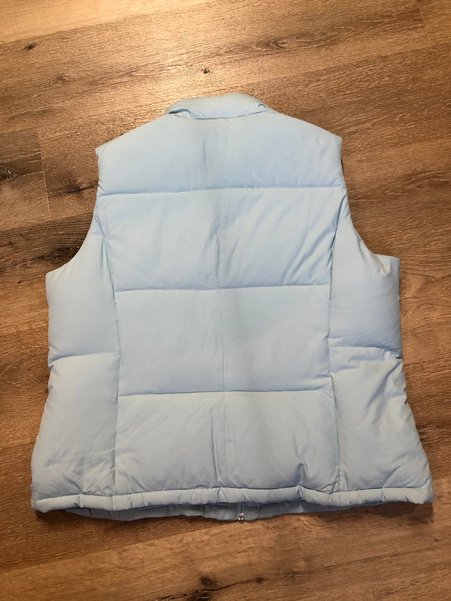 Kingspier Vintage - Alpinetek baby blue down filled puffer vest with zipper and snap closures, vertical zip pockets. Size large.