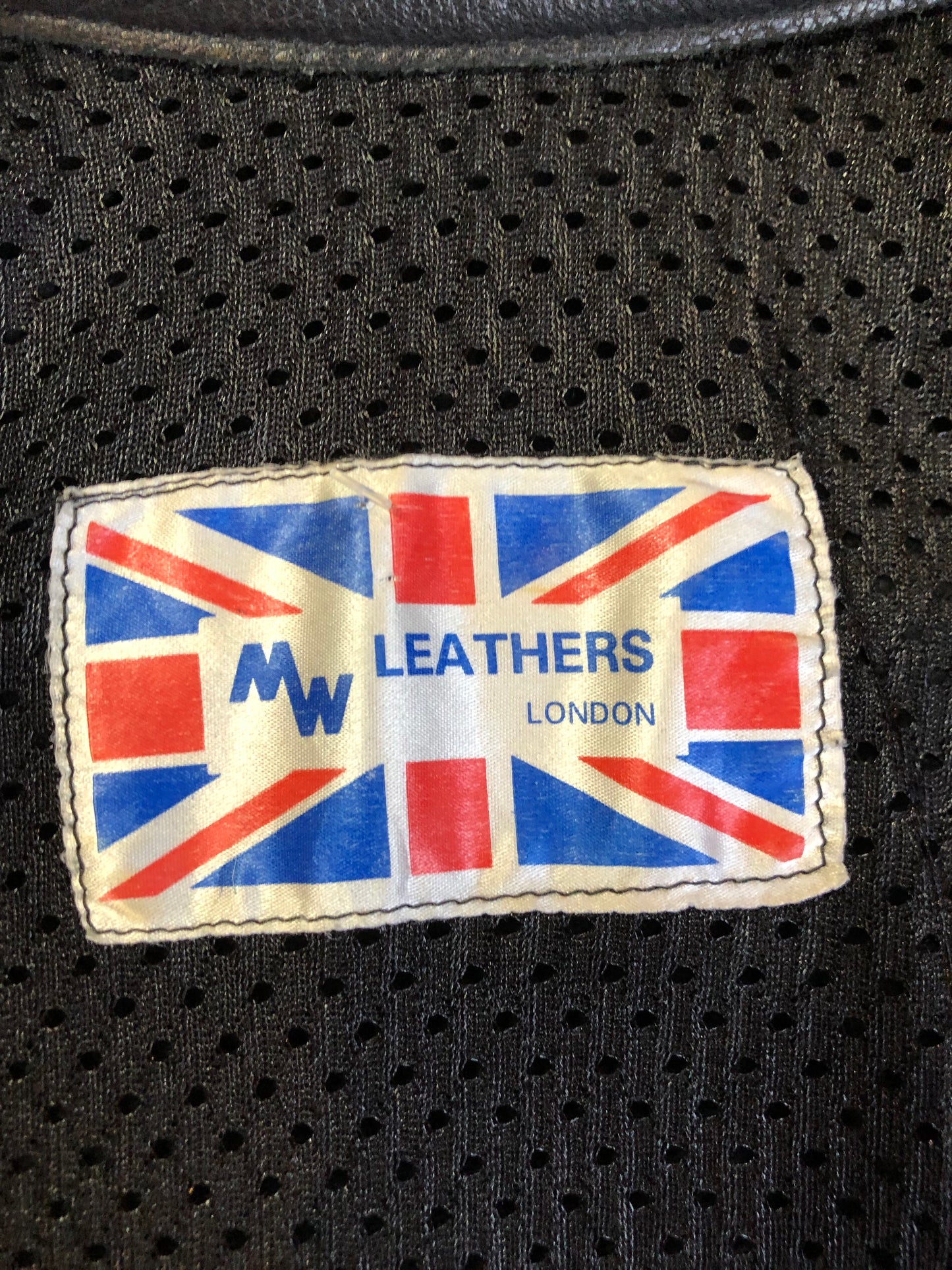 Kingspier Vintage - Vintage MW Leathers black full grain leather motorcycle jacket with mesh lining,snap collar, zipper closure, zip pockets and am inside pocket.