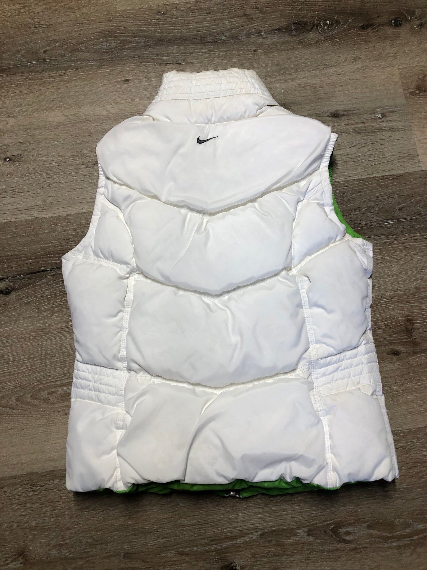 Kingspier Vintage - Nike white and green reversible down filled vest with zipper closure and slash pockets. size small.