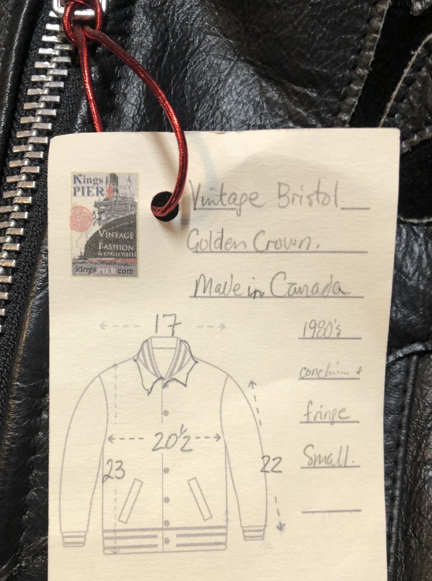 Kingspier Vintage - Vintage 1980’s Bristol “Golden Crown” black leather motorcycle jacket with leather fringe, suede rose applique in the front and back, silver hardware, lace up sides zipper closure, zip pockets and a quilted lining. Made in Canada. Women’s size small.