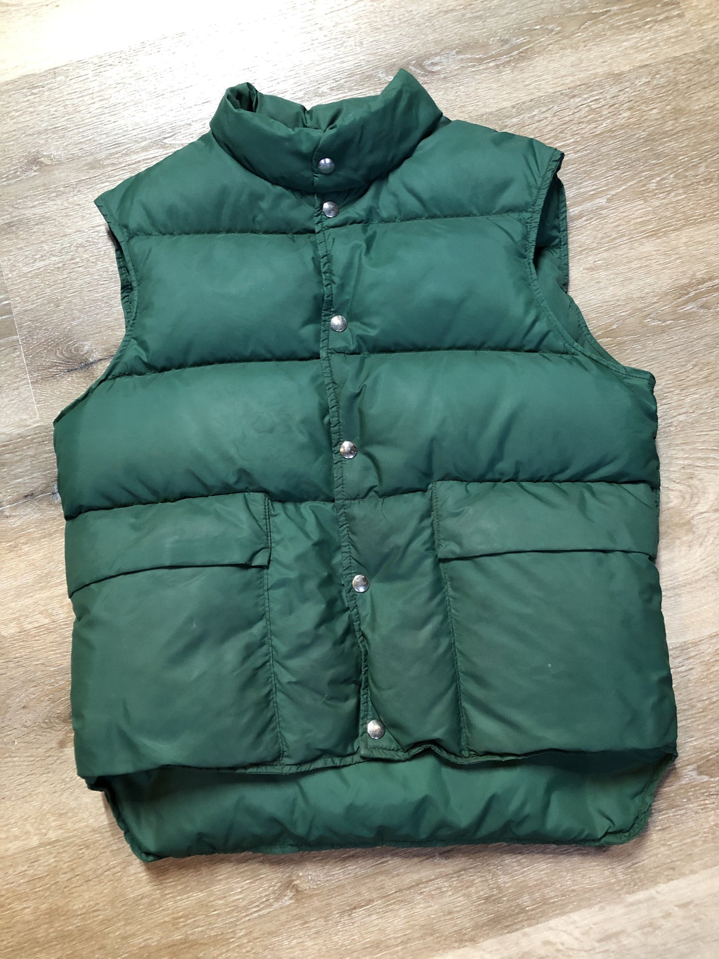 Kingspier Vintage - L.L.Bean forest green down filled puffer vest with snap closures, patch pockets and is longer in the back.