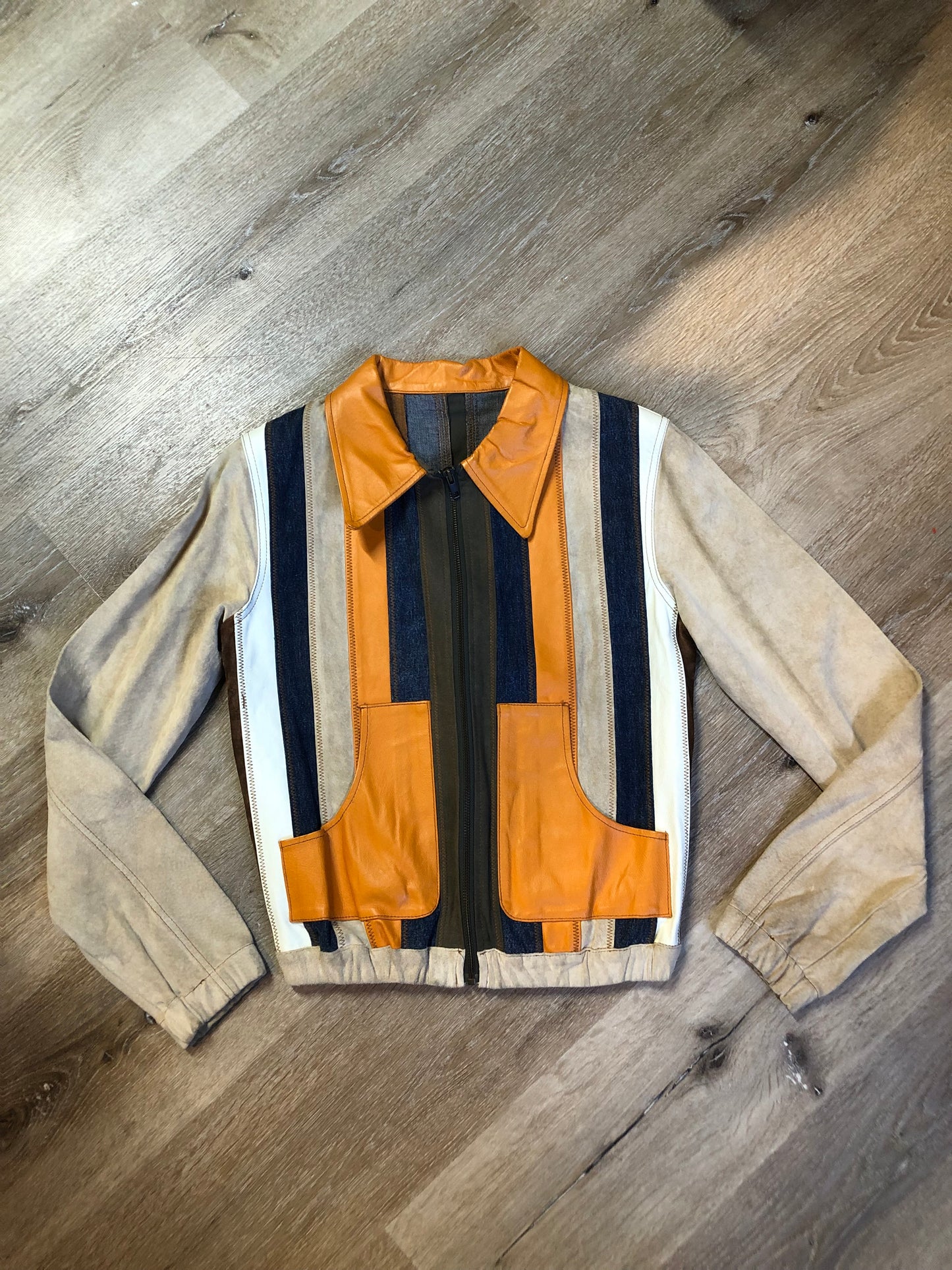 Kingspier Vintage - Very rare vintage 1970’s Gipsy Mauritius leather, suede and cotton patchwork jacket with zipper closure and patch pockets. Size small.