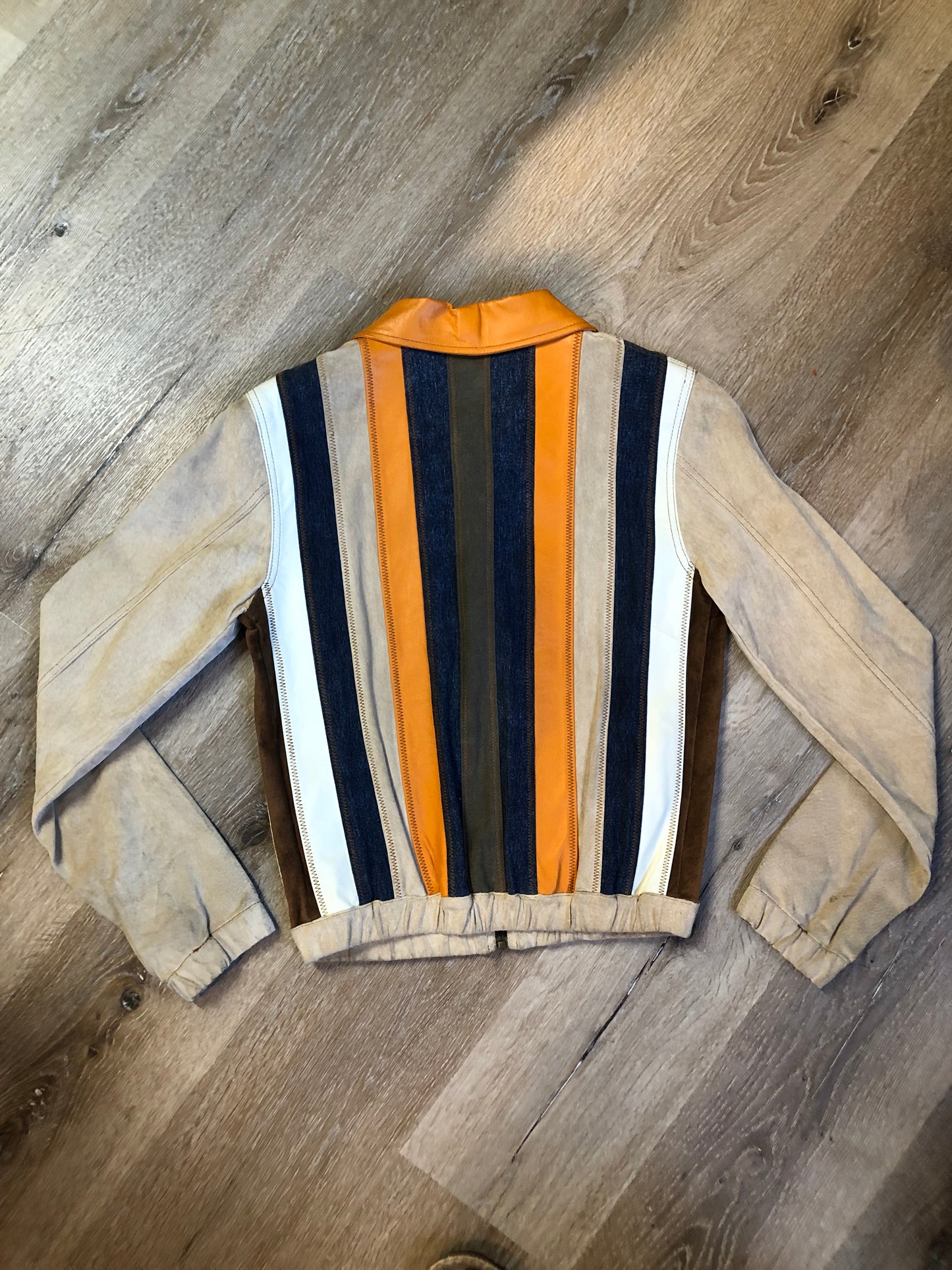 Kingspier Vintage - Very rare vintage 1970’s Gipsy Mauritius leather, suede and cotton patchwork jacket with zipper closure and patch pockets. Size small.