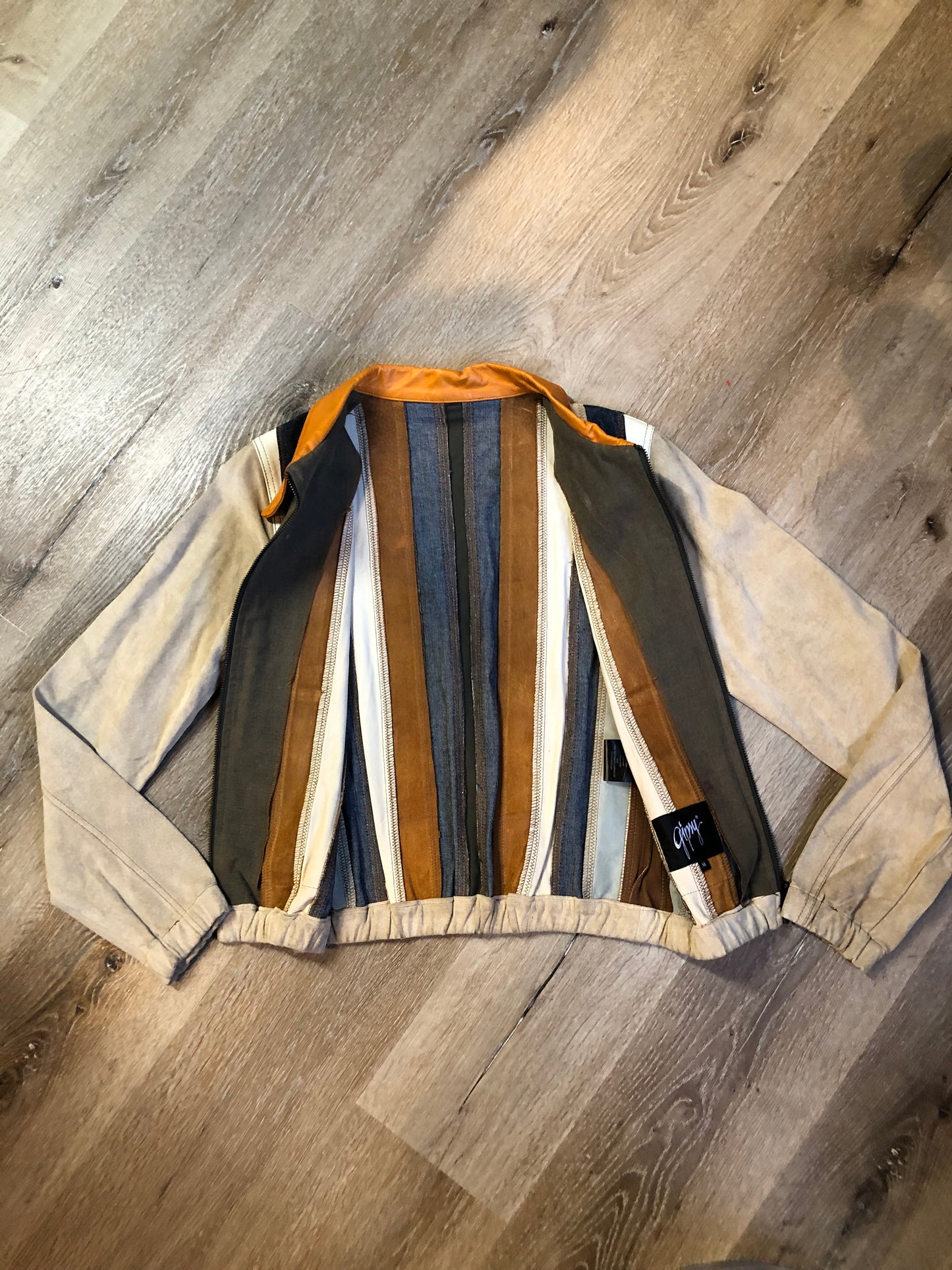 Kingspier Vintage - Very rare vintage 1970’s Gipsy Mauritius leather, suede and cotton patchwork jacket with zipper closure and patch pockets. Size small.