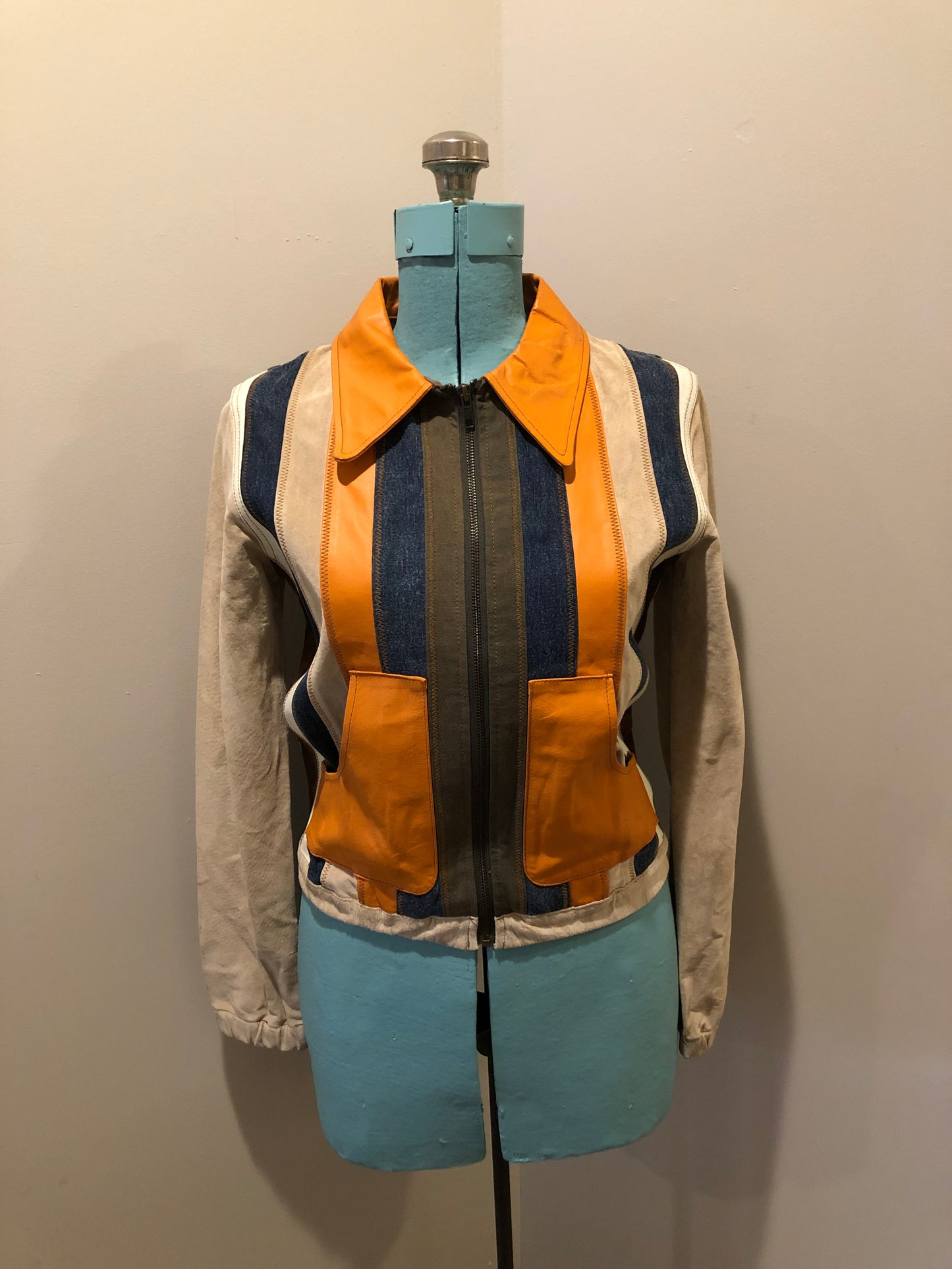 Kingspier Vintage - Very rare vintage 1970’s Gipsy Mauritius leather, suede and cotton patchwork jacket with zipper closure and patch pockets. Size small.
