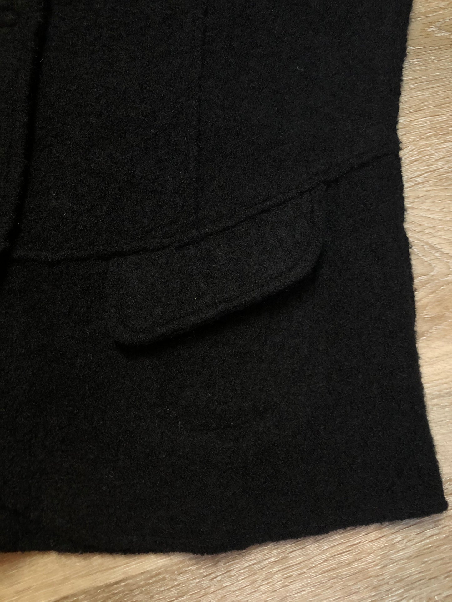 Kingspier Vintage - Venario black wool vest with red paisley lining, snap closures and flap pockets.