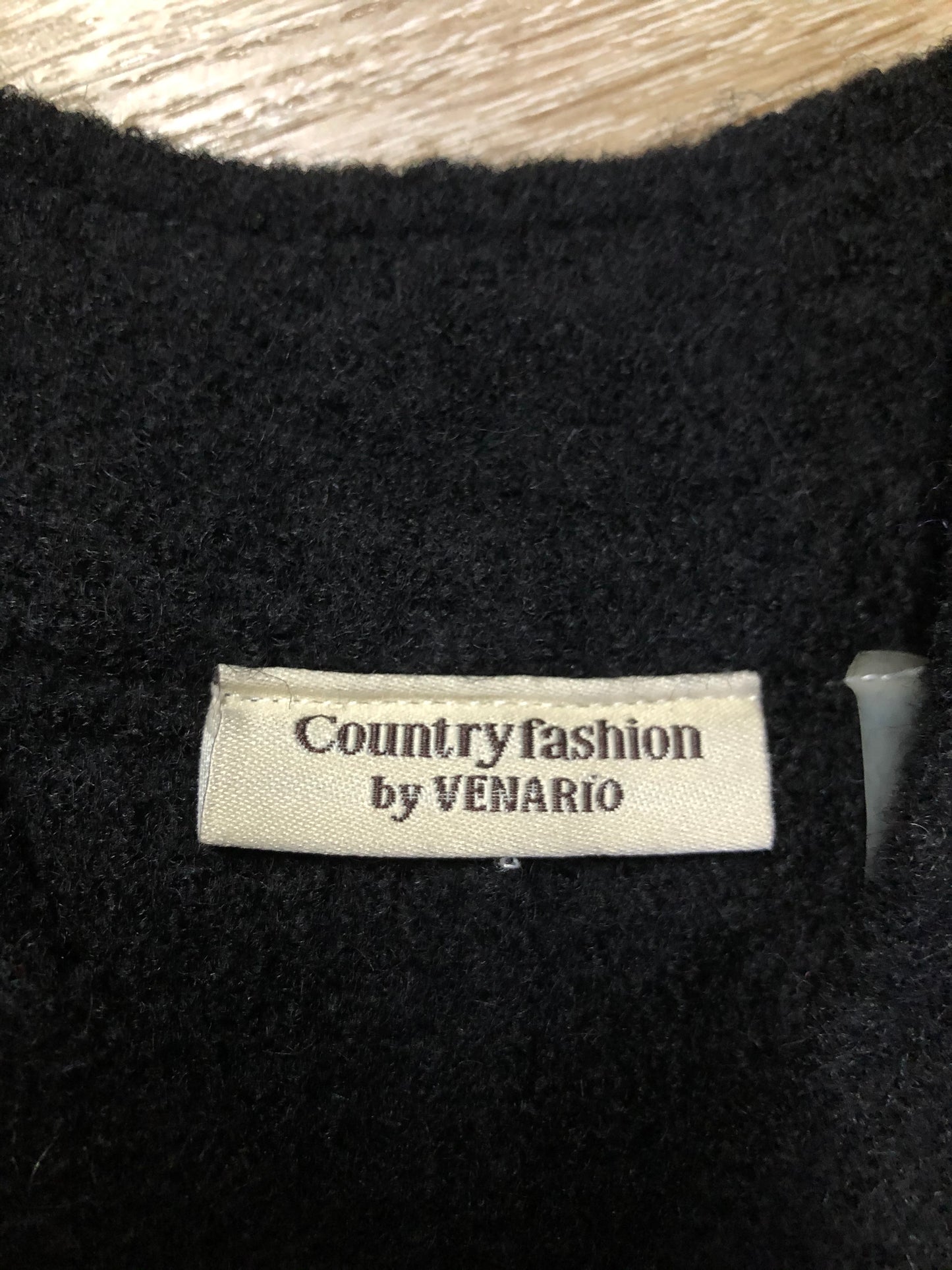 Kingspier Vintage - Venario black wool vest with red paisley lining, snap closures and flap pockets.