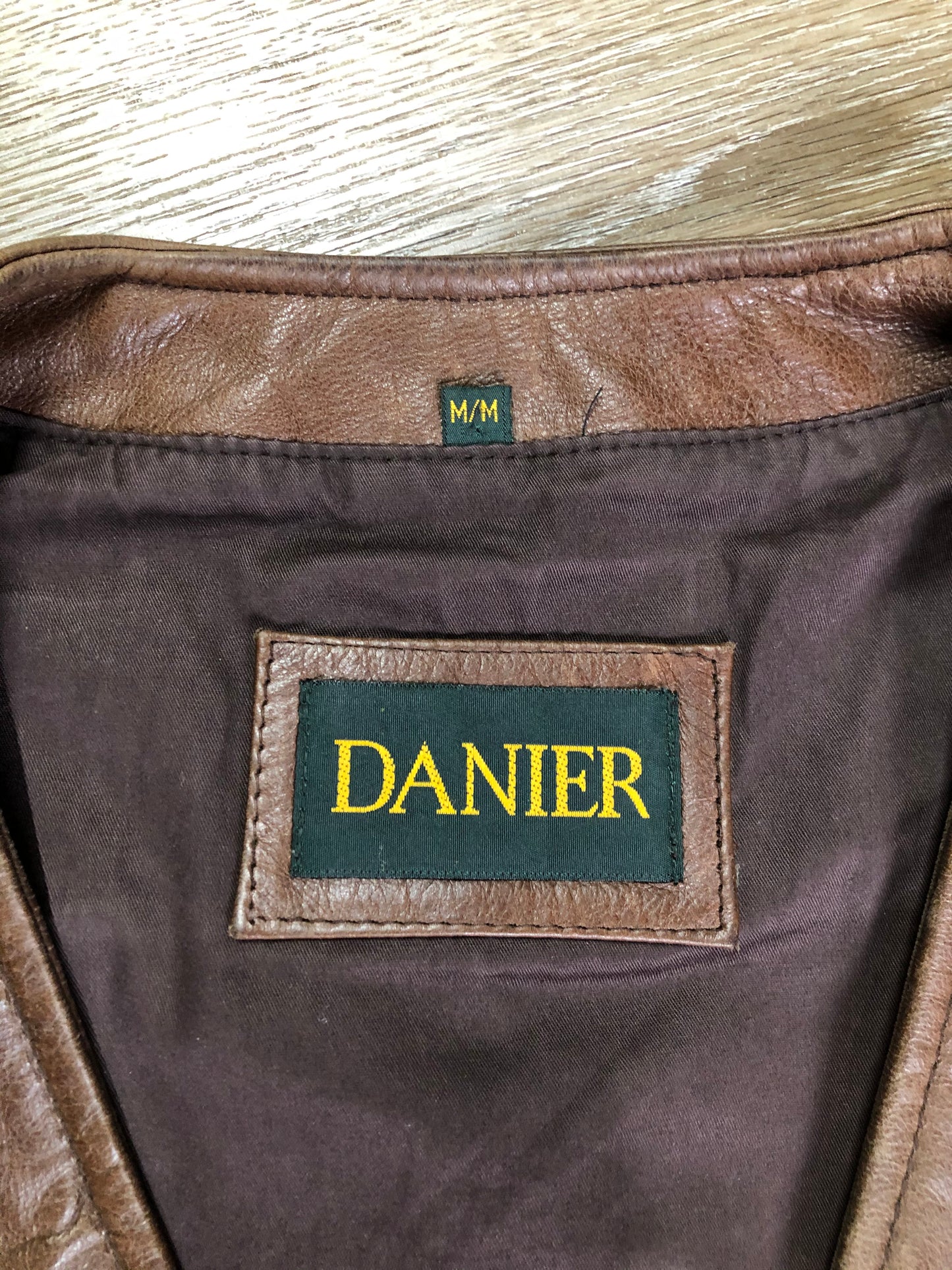 Kingspier Vintage - Danier medium brown leather vest with zipper and zip pockets. Size medium.