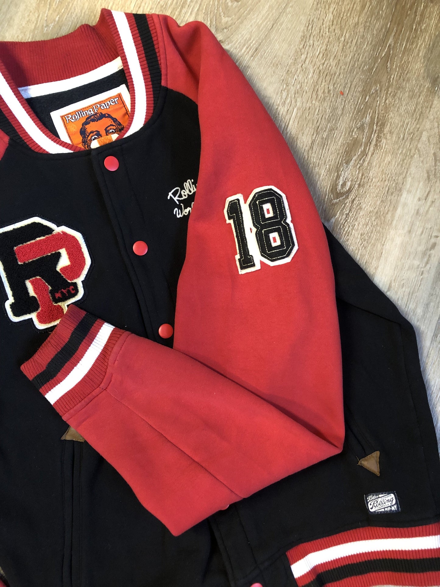 Kingspier Vintage - Vintage 1980’s Rolling Paper Co. varsity style jacket with snap closures and slash pockets. Cotton/ polyester blend. Size medium.