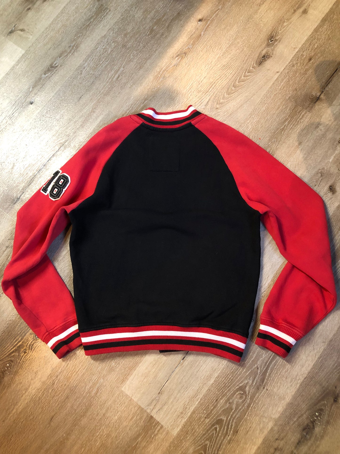 Kingspier Vintage - Vintage 1980’s Rolling Paper Co. varsity style jacket with snap closures and slash pockets. Cotton/ polyester blend. Size medium.