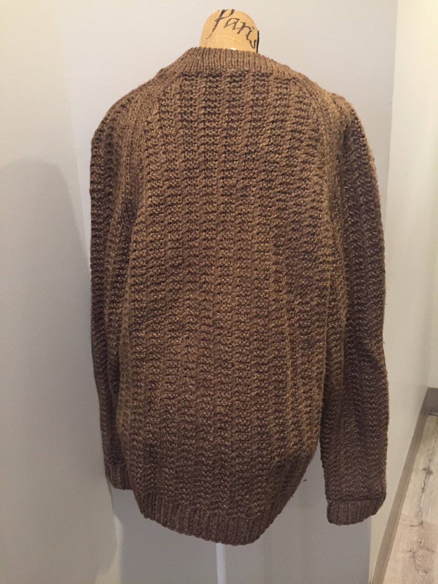Kingspier Vintage - Hand knit short v-neck sweater in brown. Fibres are unknown.