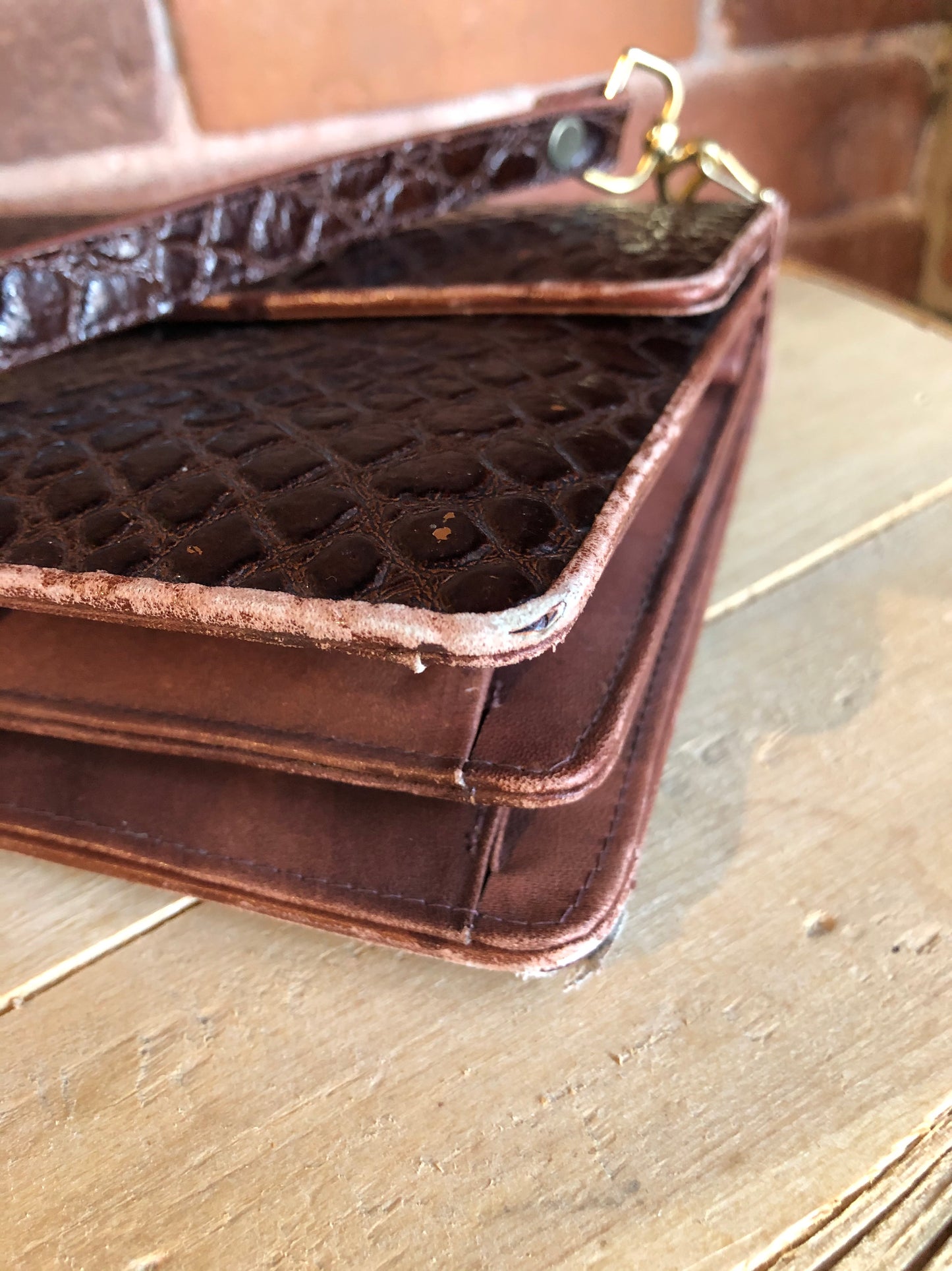 Kingspier Vintage - Dark brown reptile handbag with top handle, brass hardware, push button front clasp, detachable shoulder strap, inside pockets and leather lining.