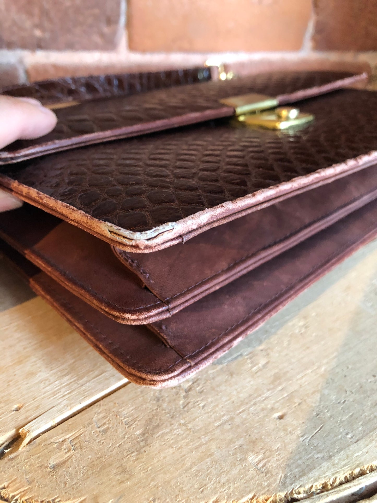 Kingspier Vintage - Dark brown reptile handbag with top handle, brass hardware, push button front clasp, detachable shoulder strap, inside pockets and leather lining.