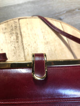 Load image into Gallery viewer, Kingspier Vintage - Deep red leather handbag circa 1950’s with brass metal details and clasp.
