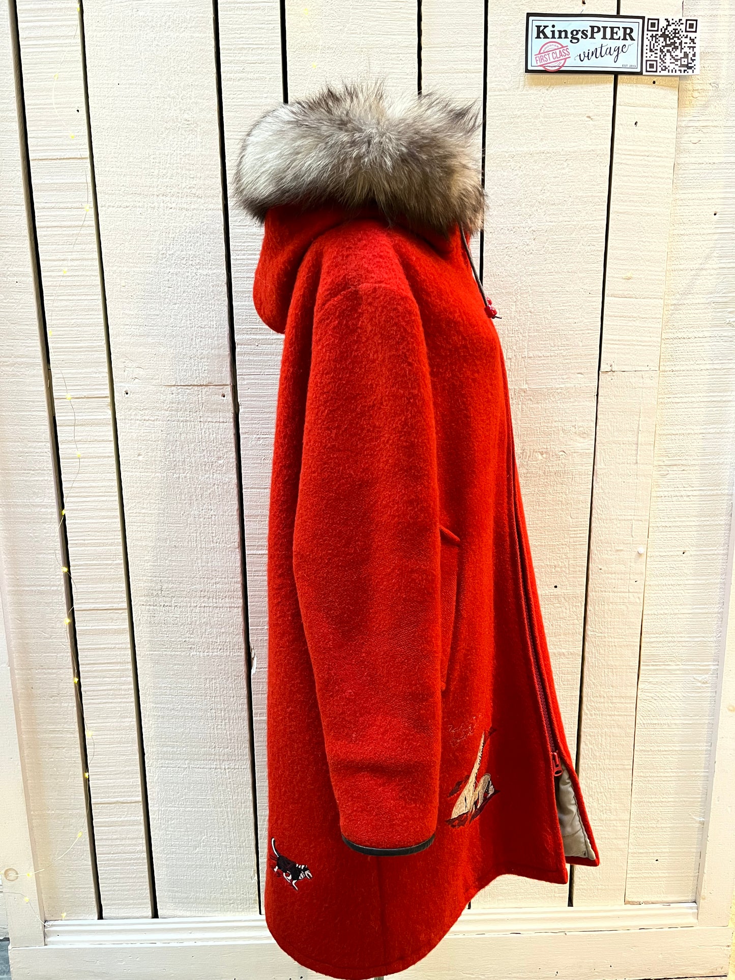 Vintage Central Sportswear Co. red 100% pure virgin wool northern parka with zipper closure, handwarmer pockets, quilted lining, fur trimmed hood and embroidered northern life motif.
Made in Canada
Size 12