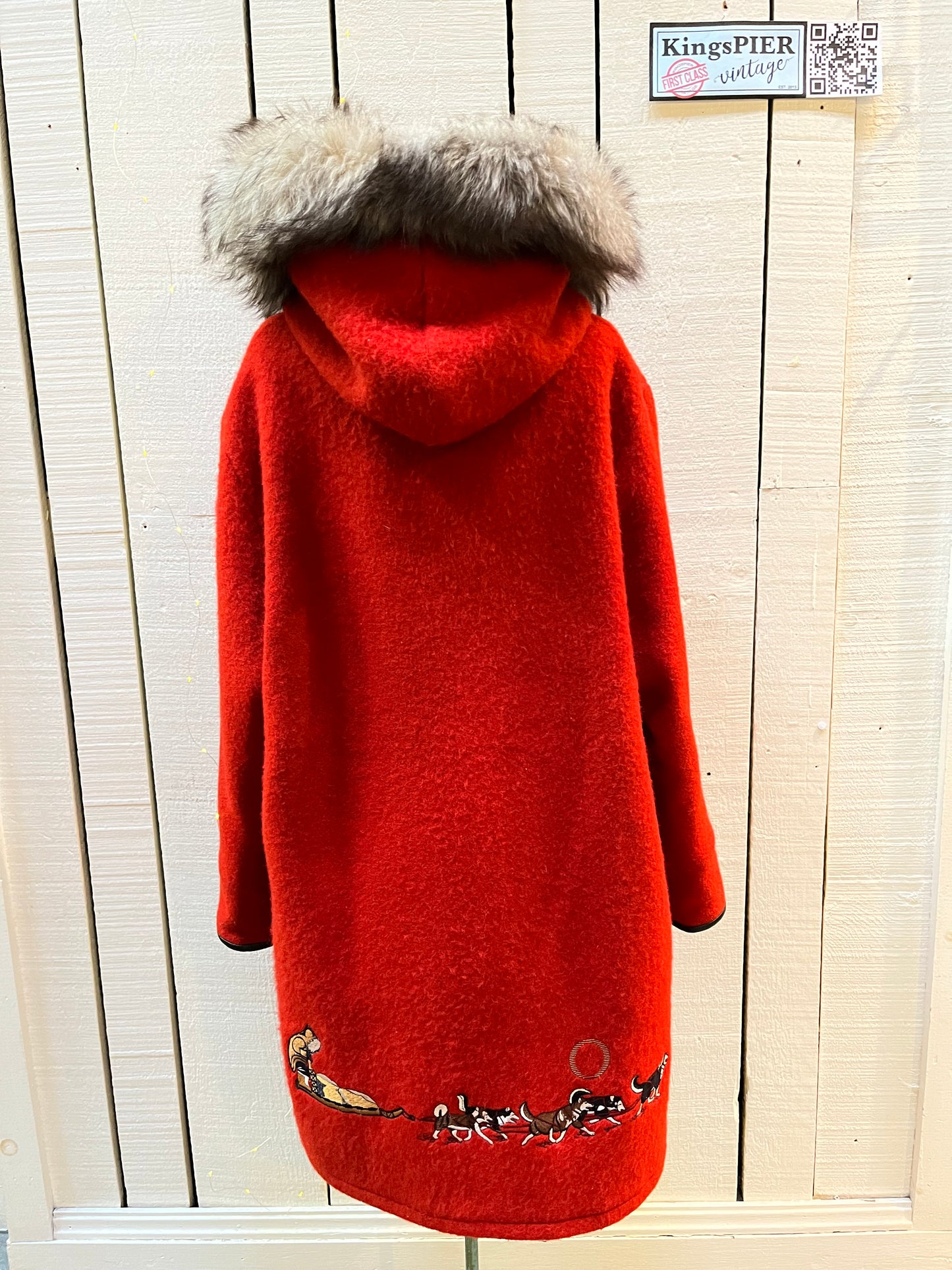 Vintage Central Sportswear Co. red 100% pure virgin wool northern parka with zipper closure, handwarmer pockets, quilted lining, fur trimmed hood and embroidered northern life motif.
Made in Canada
Size 12