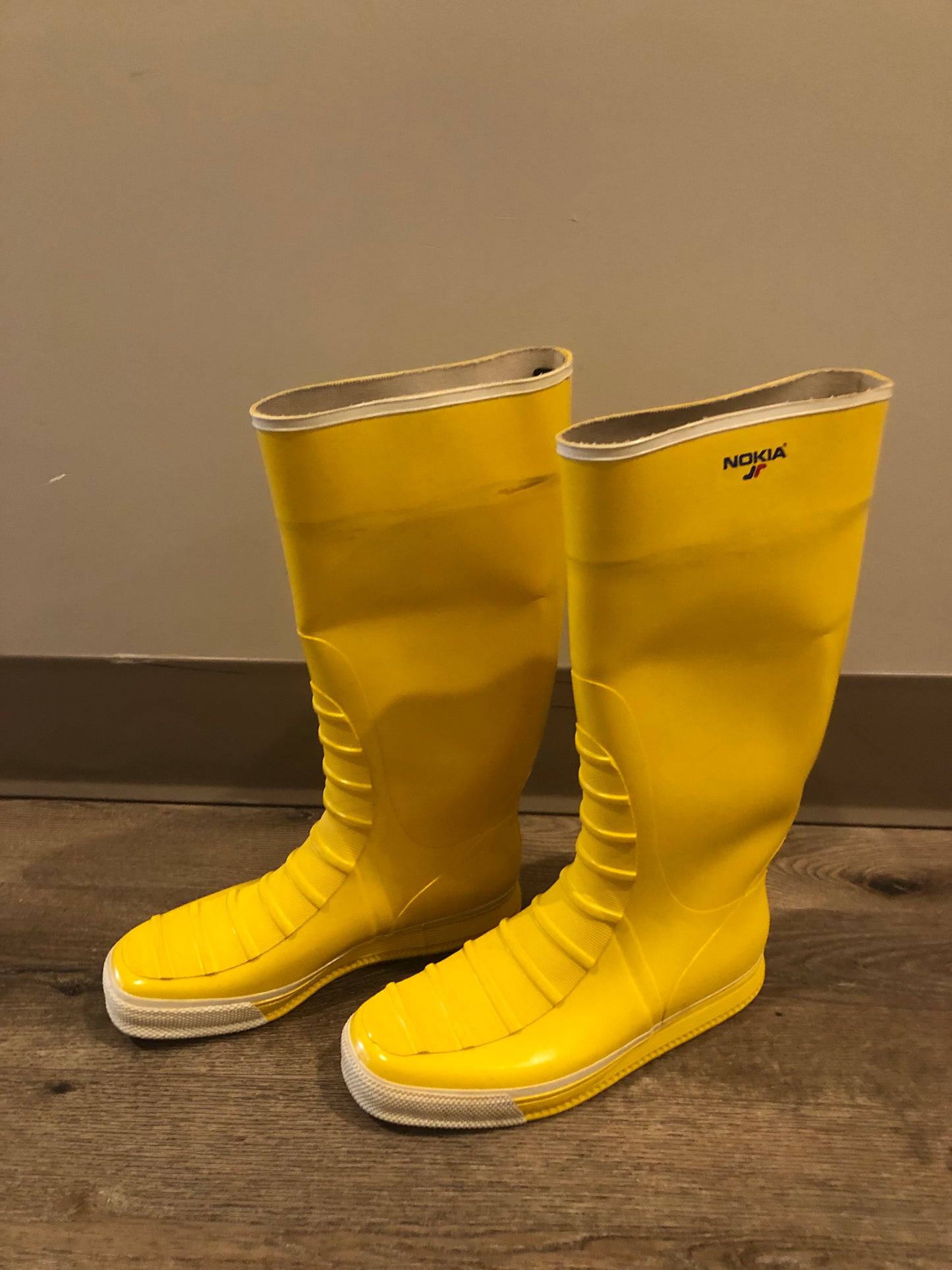 Original Nokia yellow and white rubber sailing boots circa 1980’s are handmade in Finland by the same company that makes cell phones. Nokia no longer makes boots. Size 13M /15W US, 46 EUR