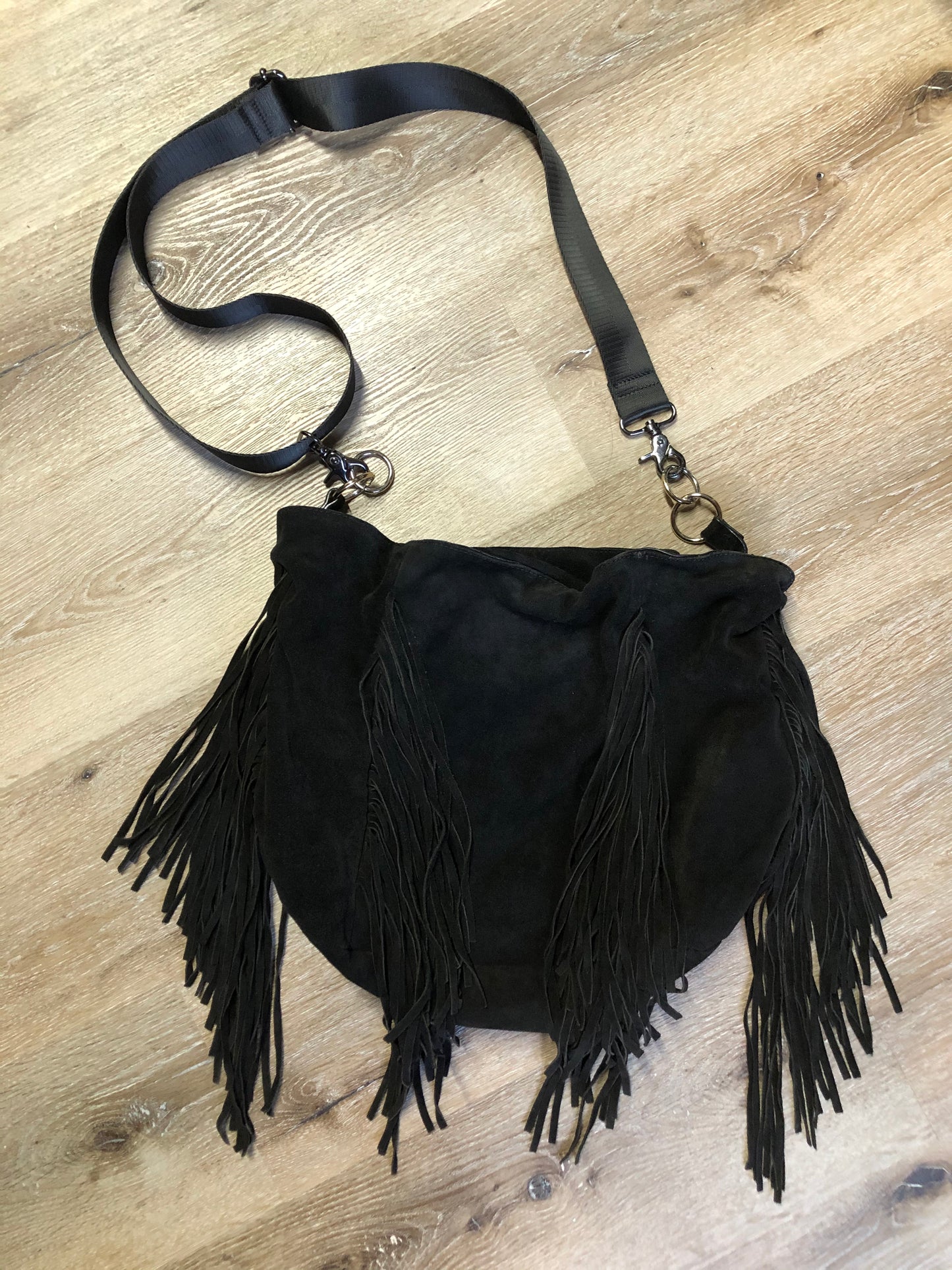 Kingspier Vintage - Zara black suede fringe crossbody bag with magnetic closures and adjustable strap.