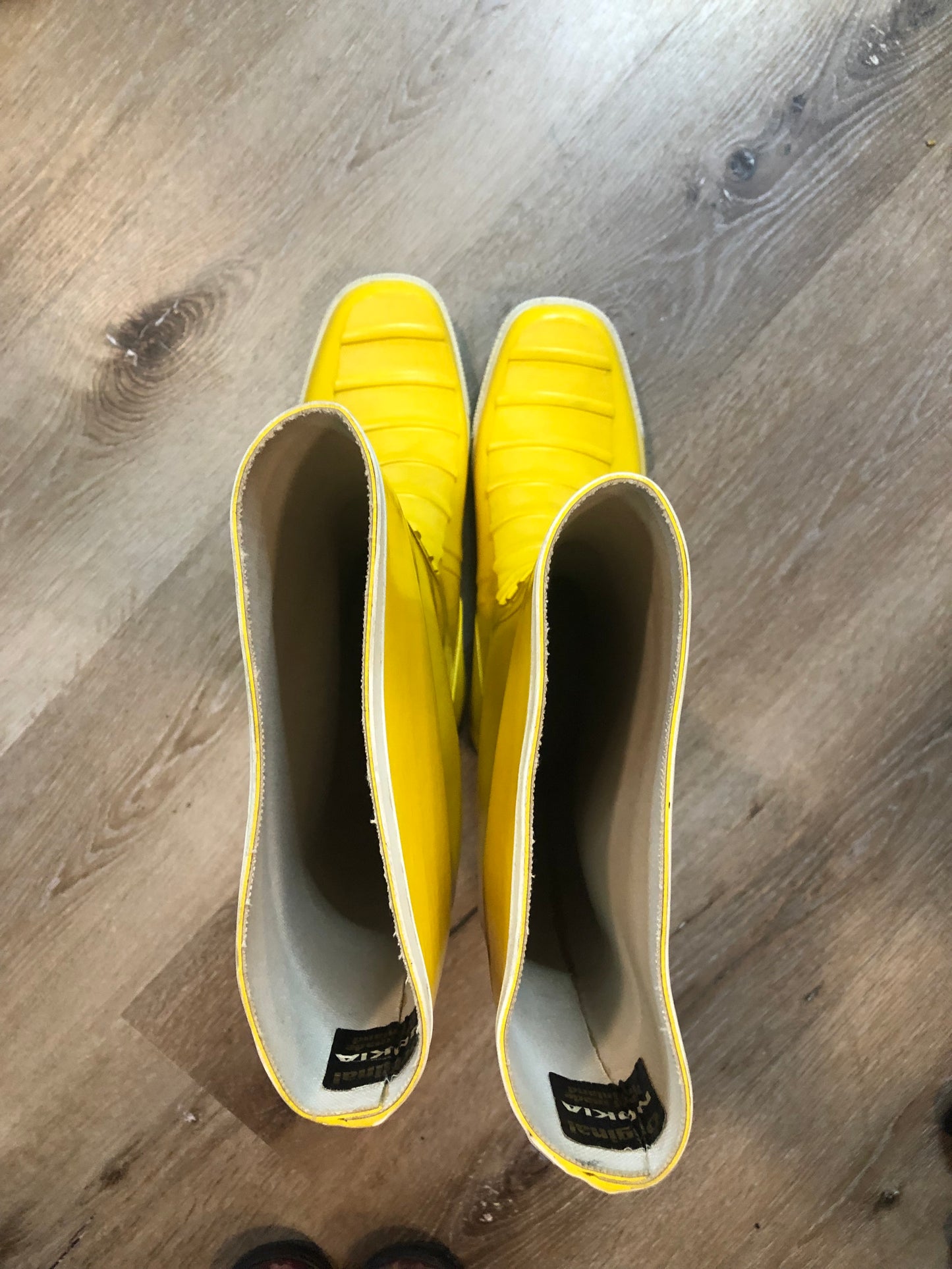 Original Nokia yellow and white rubber sailing boots circa 1980’s are handmade in Finland by the same company that makes cell phones. Nokia no longer makes boots. Size 13M /15W US, 46 EUR