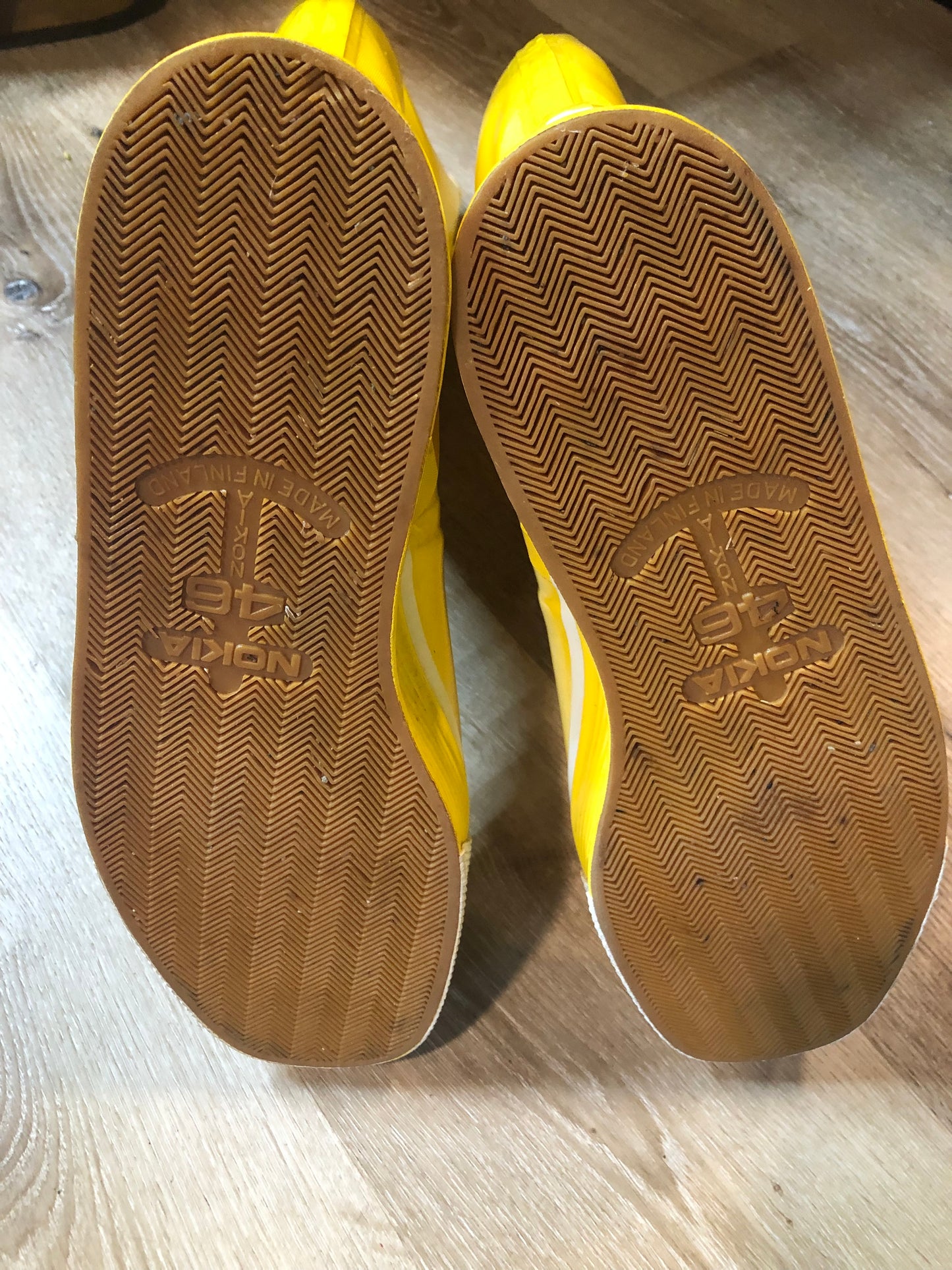 Original Nokia yellow and white rubber sailing boots circa 1980’s are handmade in Finland by the same company that makes cell phones. Nokia no longer makes boots. Size 13M /15W US, 46 EUR