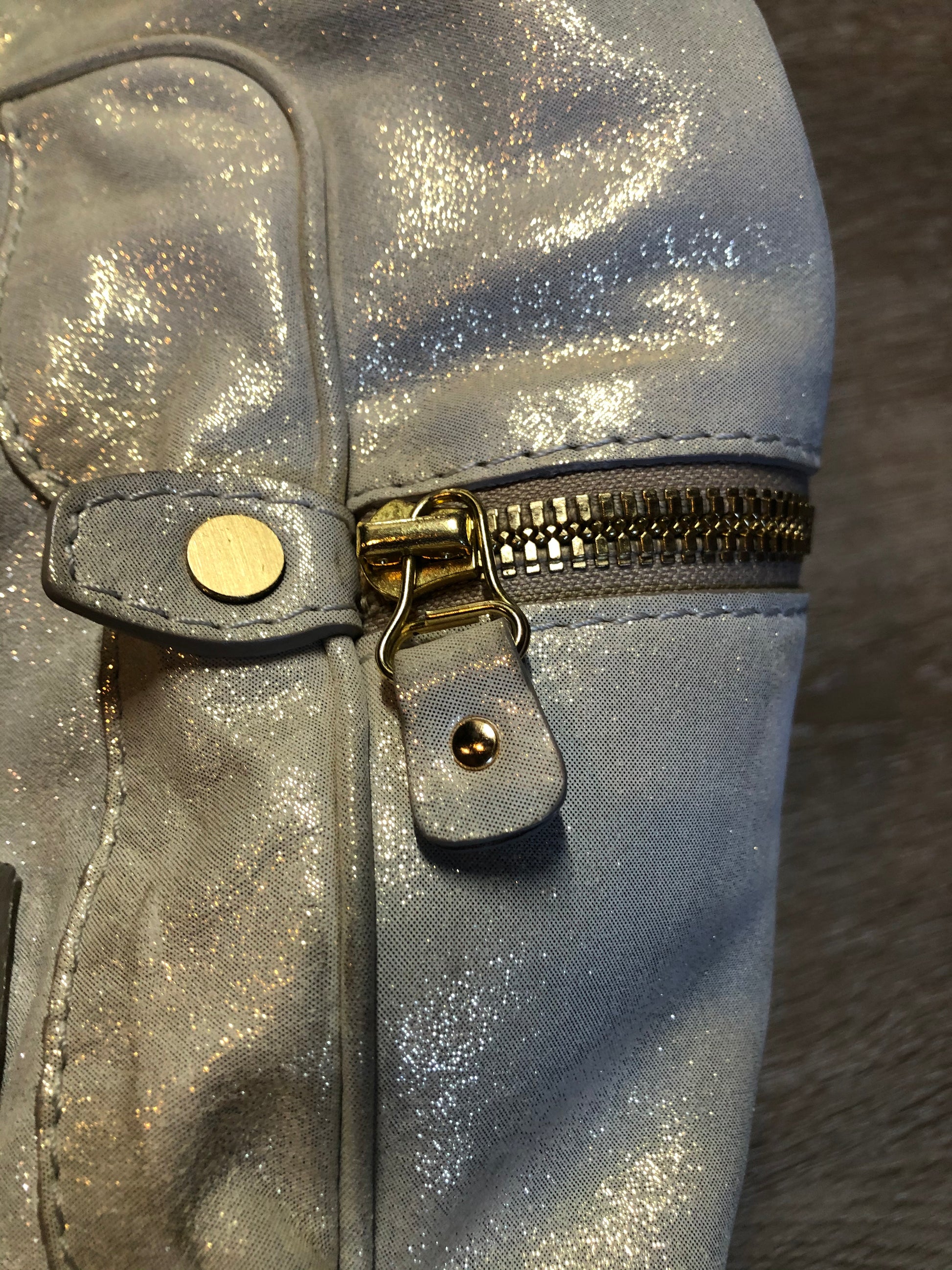 Kingspier Vintage - Authentic Jimmy Choo Melena XL tote in Iridescent white calfskin leather with zip closures, gold hardware and suede lining.