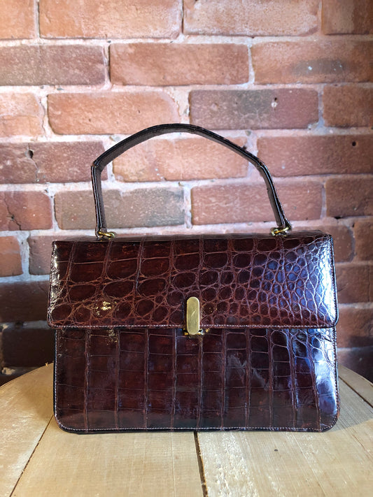 Kingspier Vintage - Bellestone red/brown lizard handbag, circa 1970’s with top handle, leather lining, brass hardware and clasp closure.