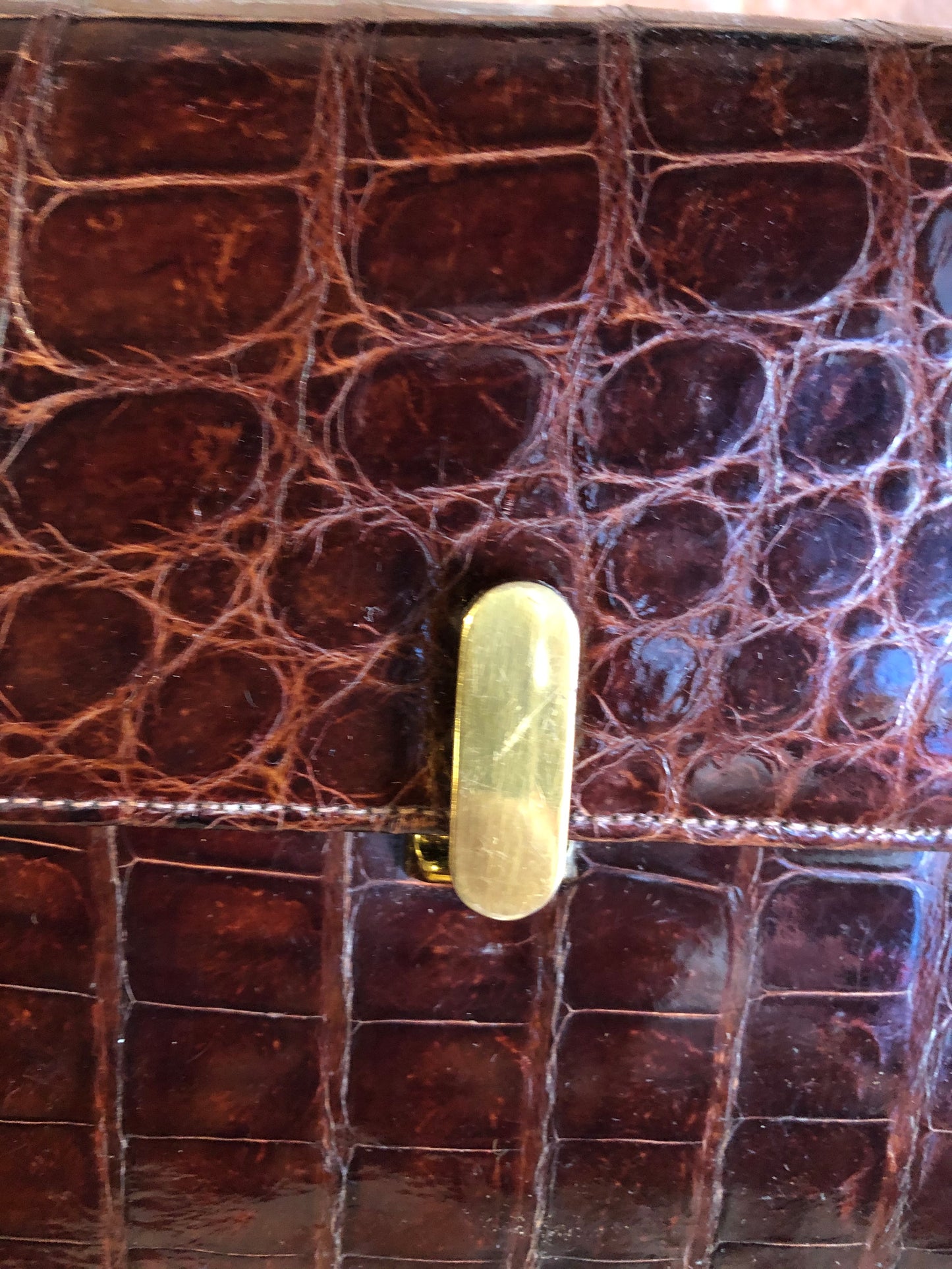 Kingspier Vintage - Bellestone red/brown lizard handbag, circa 1970’s with top handle, leather lining, brass hardware and clasp closure.