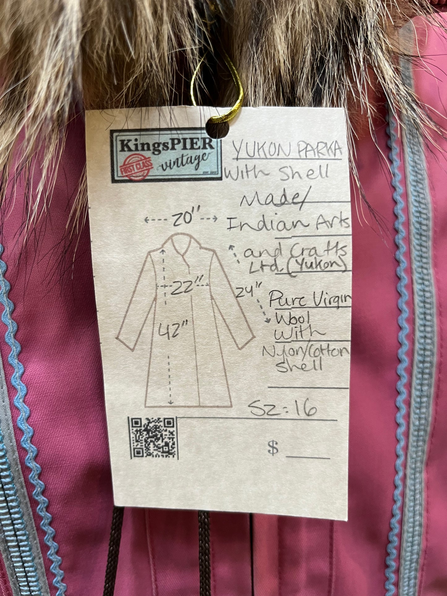 Vintage Yukon Indian Arts and Crafts LTD 100% pure virgin wool northern parka and nylon/ cotton blend removable shell with white leather applique, fur trimmed hood and pom poms, zipper closure, pockets, and hand embroidered flower details.
Made in USA
Size 16