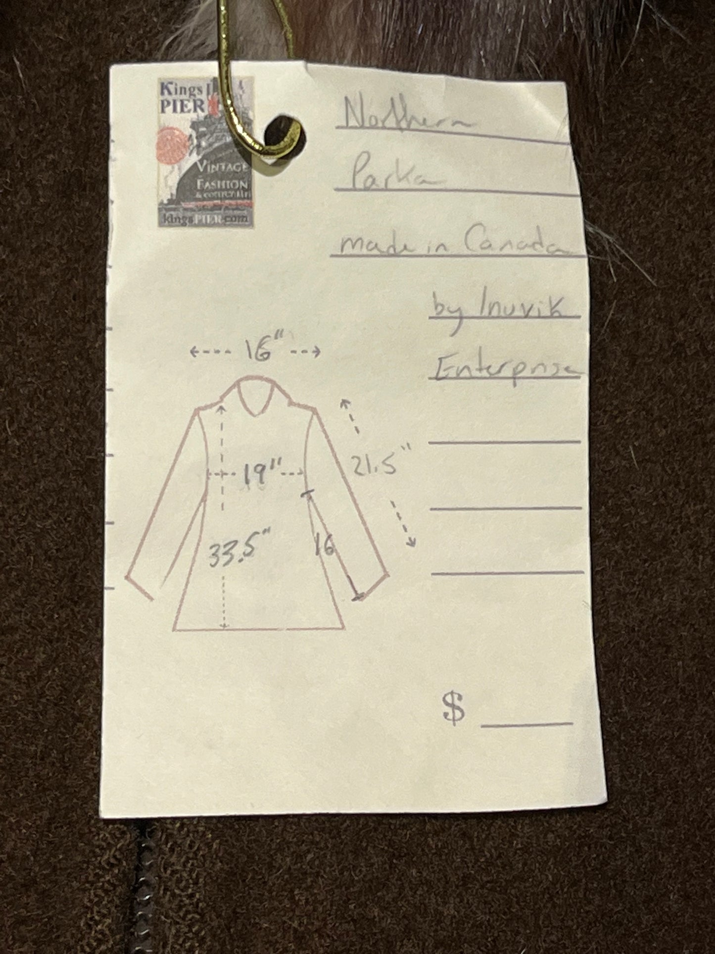 Vintage Inuvik Enterprise brown 100% pure virgin wool northern parka with zipper closure, front pockets, fur trimmed hood and felt applique in a drumming motif.
Made in Canada
Chest 38”